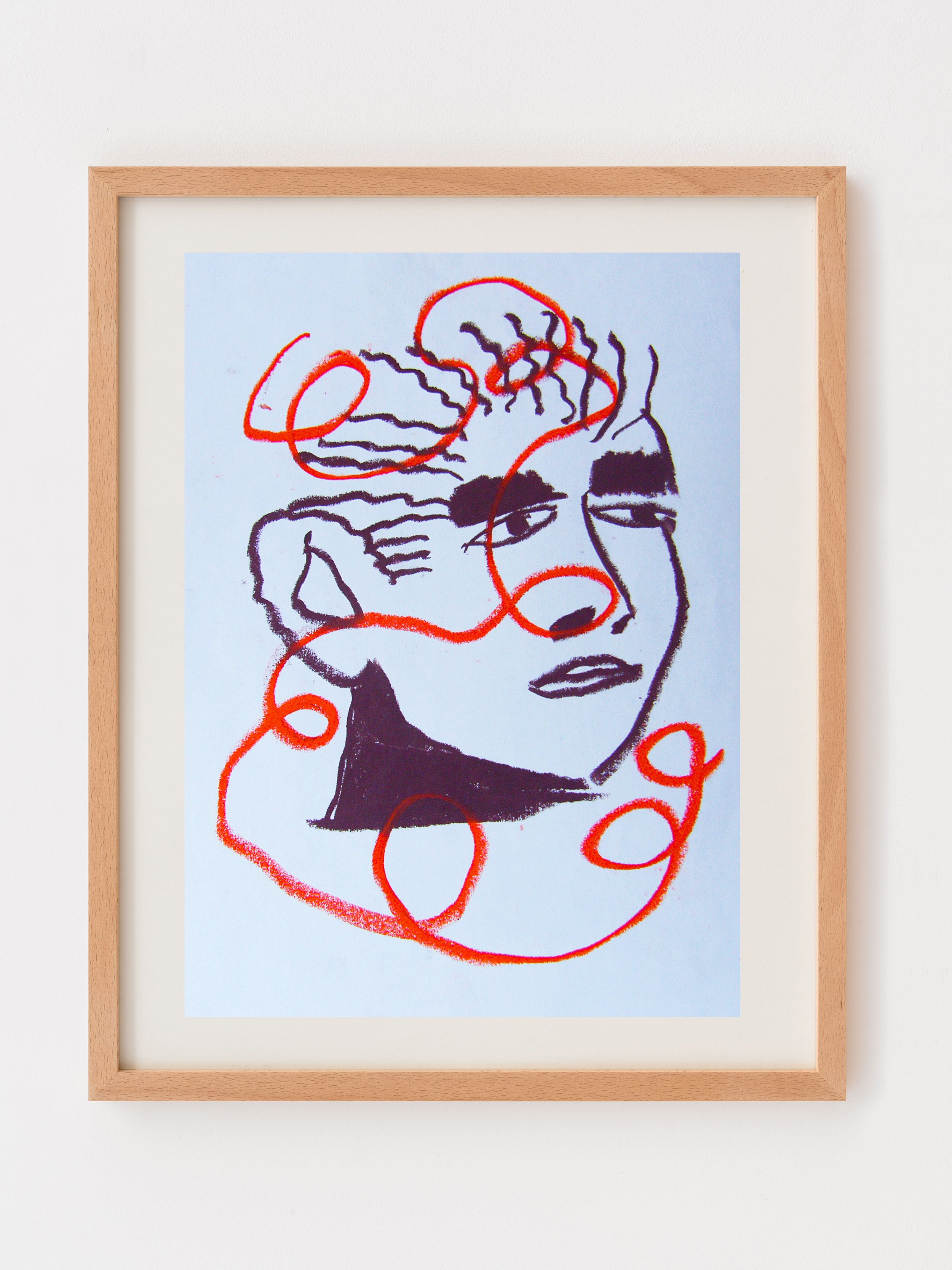 Framed abstract drawing with black and red lines depicting a stylized face on a light blue background.