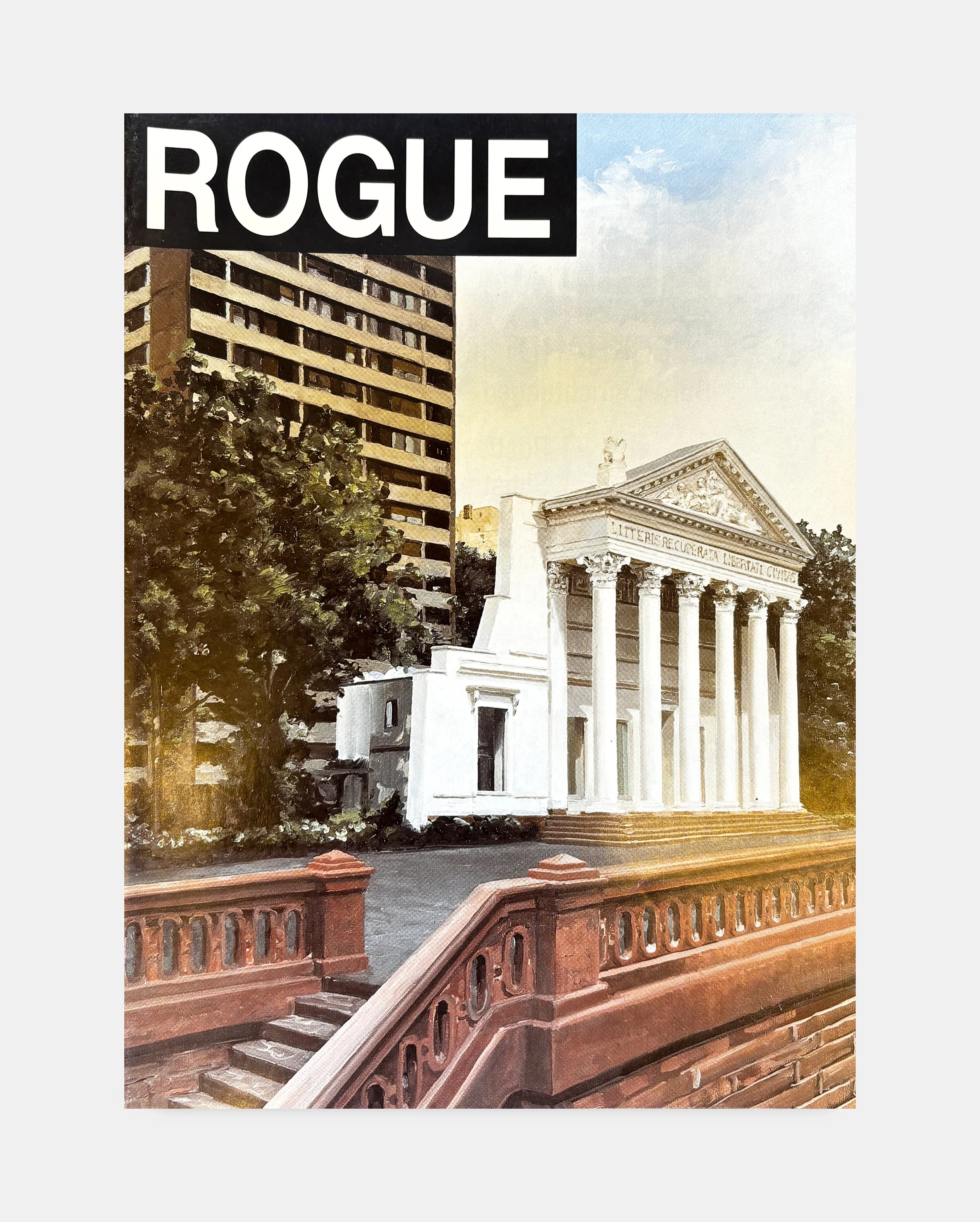 A view of a city street featuring a white classical building with Greek columns and a triangular pediment, a black sign with the word 'ROGUE' on it, and tall modern buildings in the background.