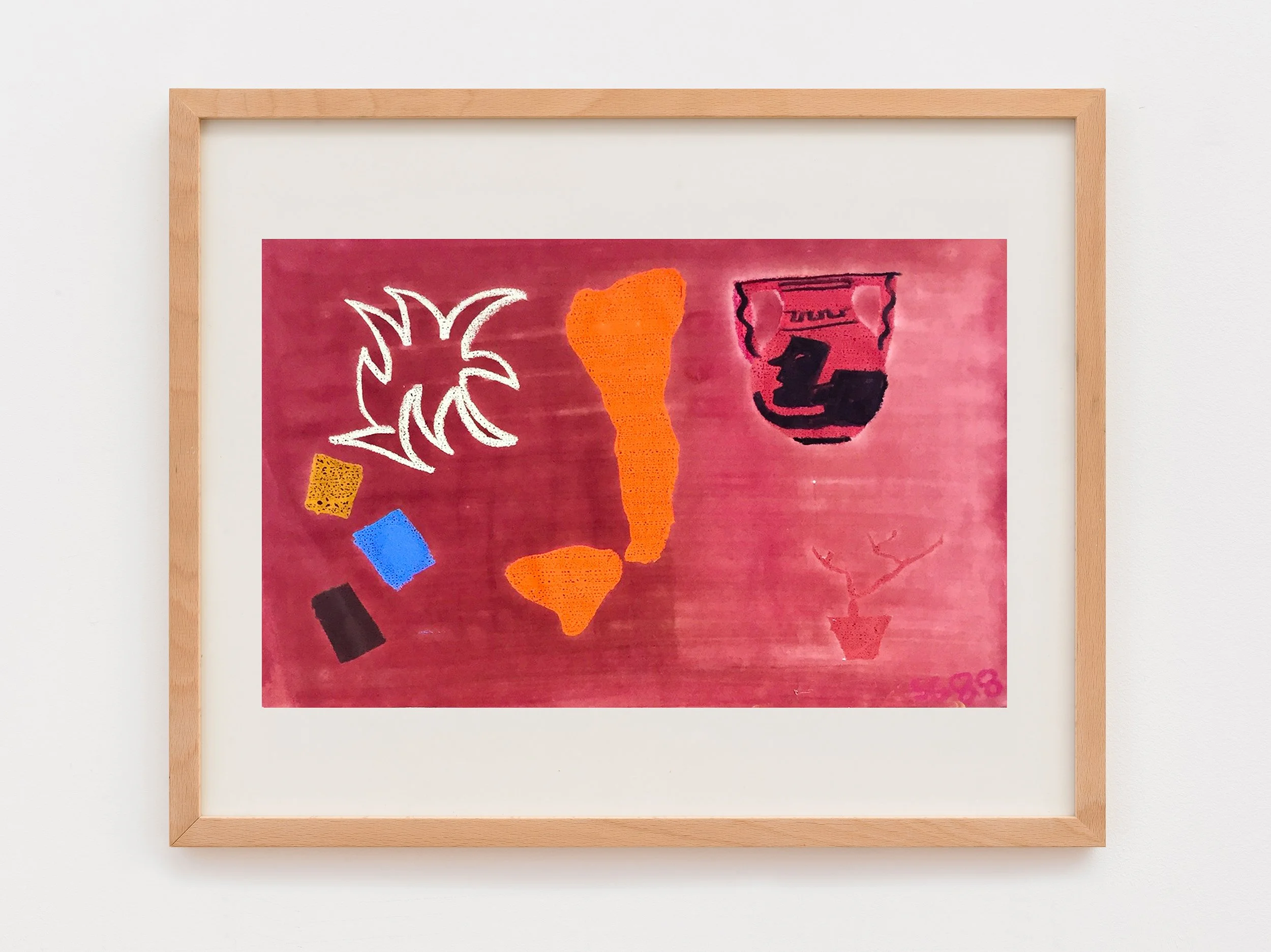 Artwork with abstract shapes and colors, including a white flower-like shape, an orange shape, a blue rectangle, a black and red shape, and a red background with a signature in the bottom right corner. Framed in a light wood frame.