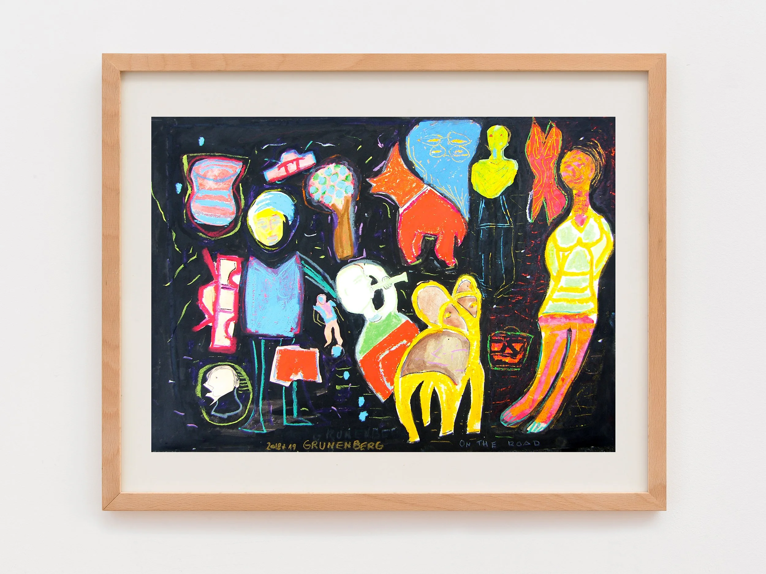 Colorful abstract artwork depicting various human-like figures, animals, and objects on a black background, framed in light wood.