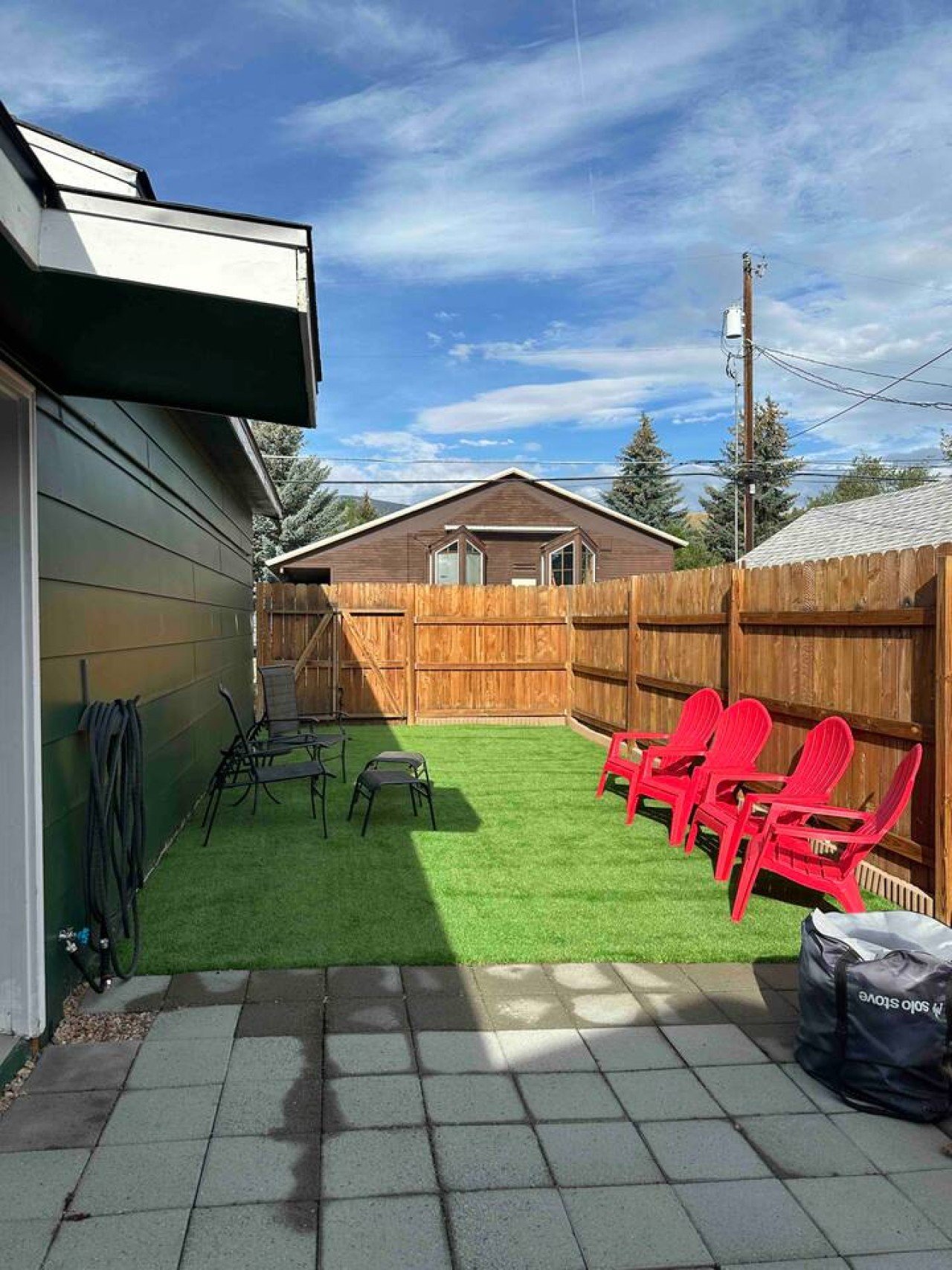 green house fenced yard for pets.jpeg