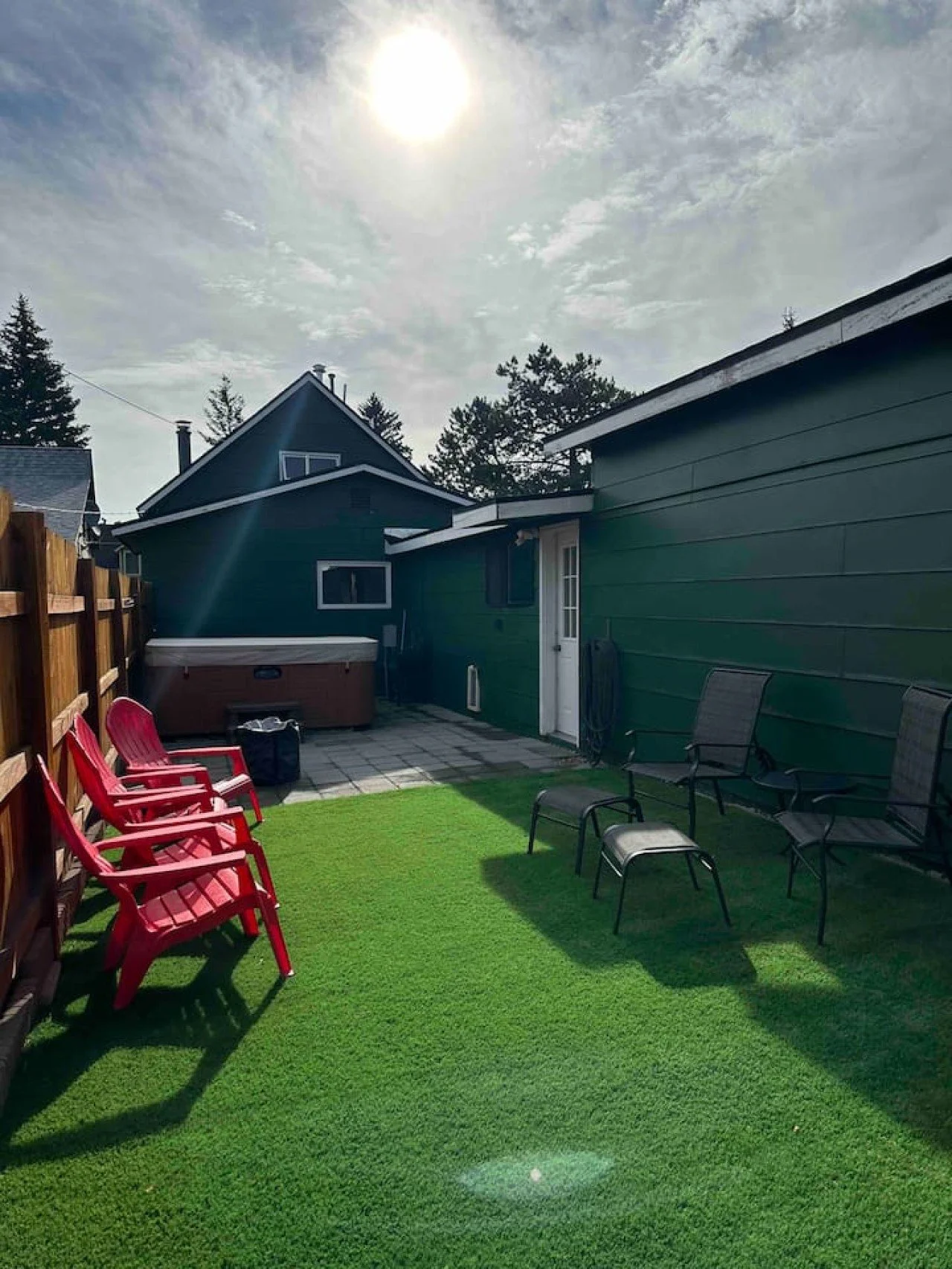 green house hot tub patio.jpeg