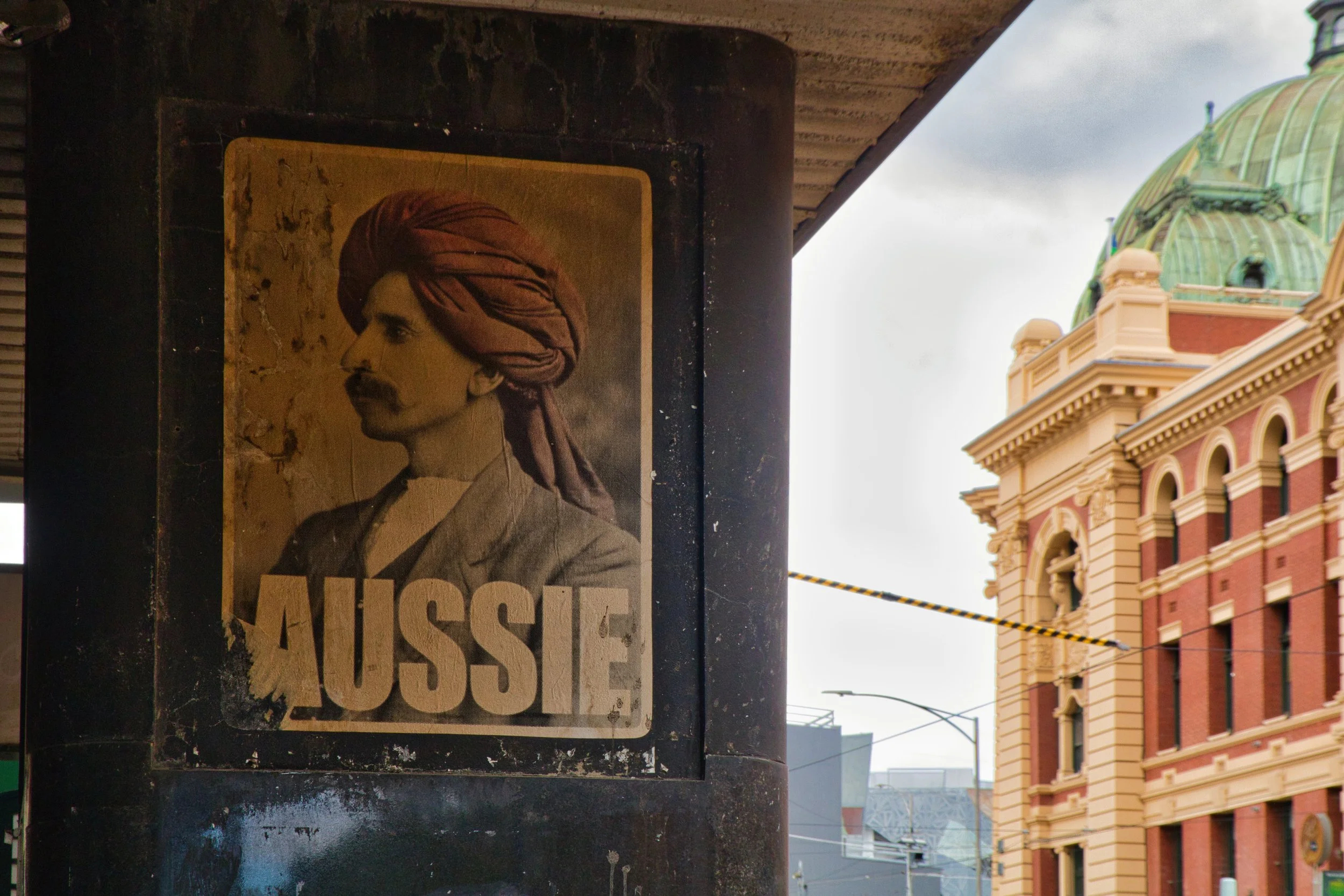 Plakat in der Flinderstreet