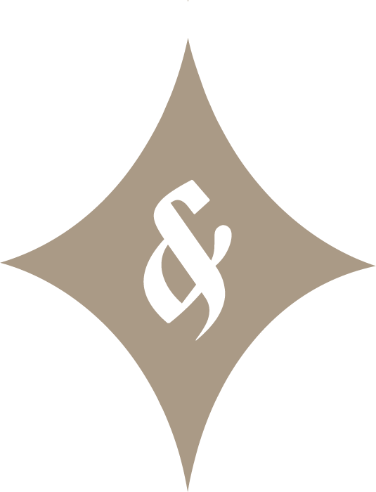A stylized logo featuring a black ampersand symbol inside a beige diamond shape with rounded points.