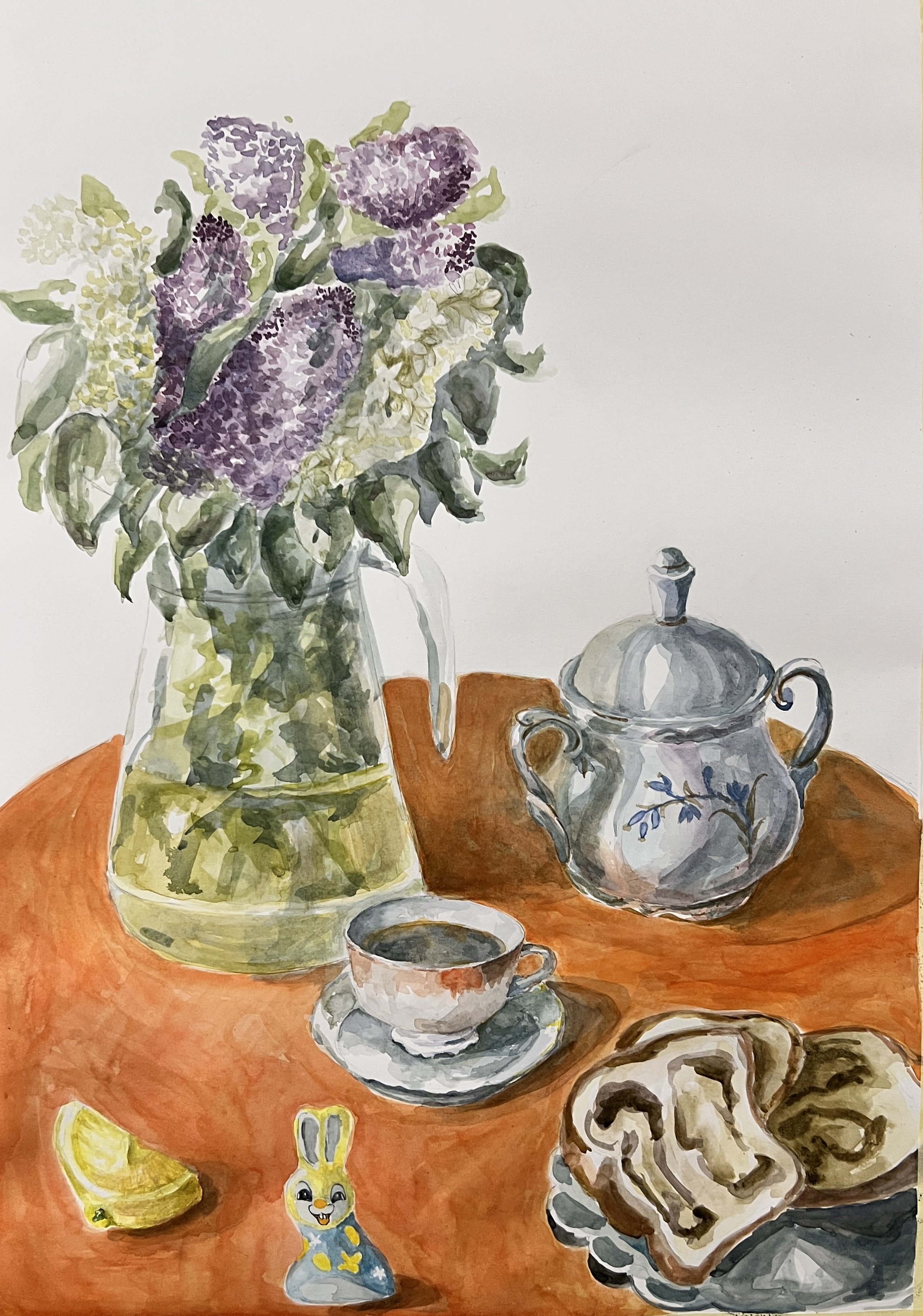 Watercolor painting of a still life scene with a bouquet of purple and white flowers in a glass vase, a teapot with floral design, a teacup with saucer filled with tea, a plate of sliced bread with swirls, a lemon wedge, and a painted bunny figurine 