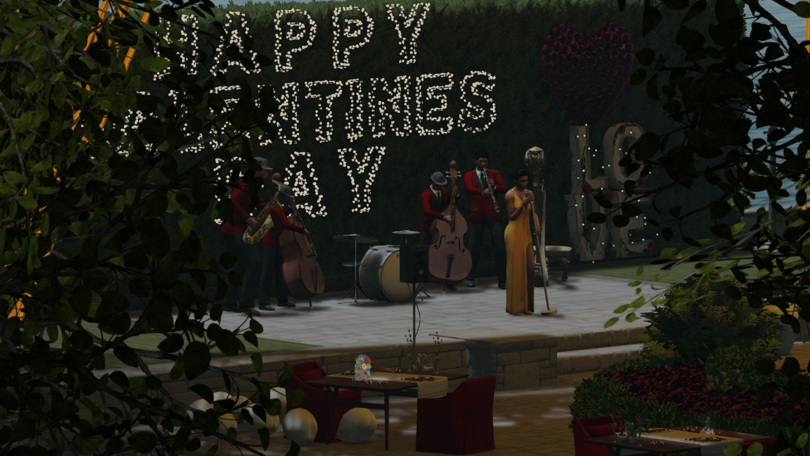 A floral arrangement with a sign reading 'Happy Valentines Day' made of flowers hangs over a live jazz band performing outdoors. The band consists of a female singer and male musicians playing saxophone, double bass, and drums. There are tables with 