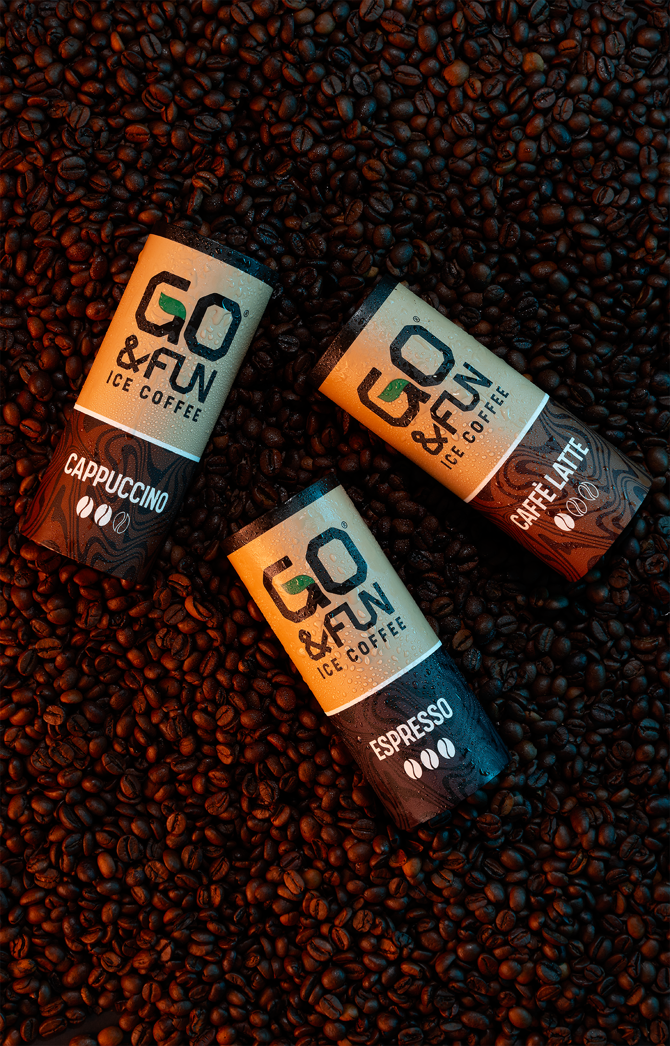 Go&Fun energy drink cans on roasted coffee beans, product photography Malta