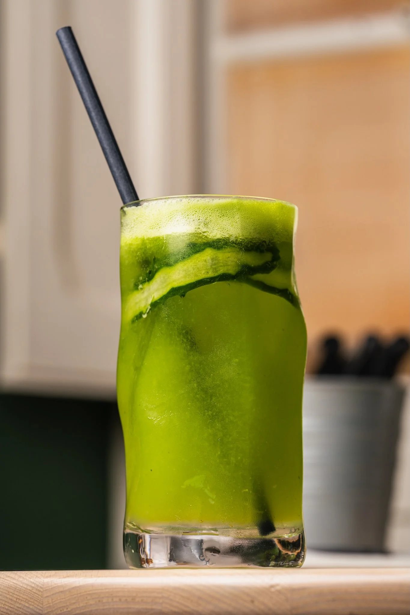 Green juice cocktail with a straw, drinks photography Malta