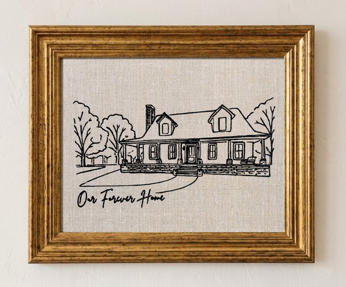Black ink sketch of a house with a porch and trees, framed in wood, with the words "Our Forever Home" written at the bottom.