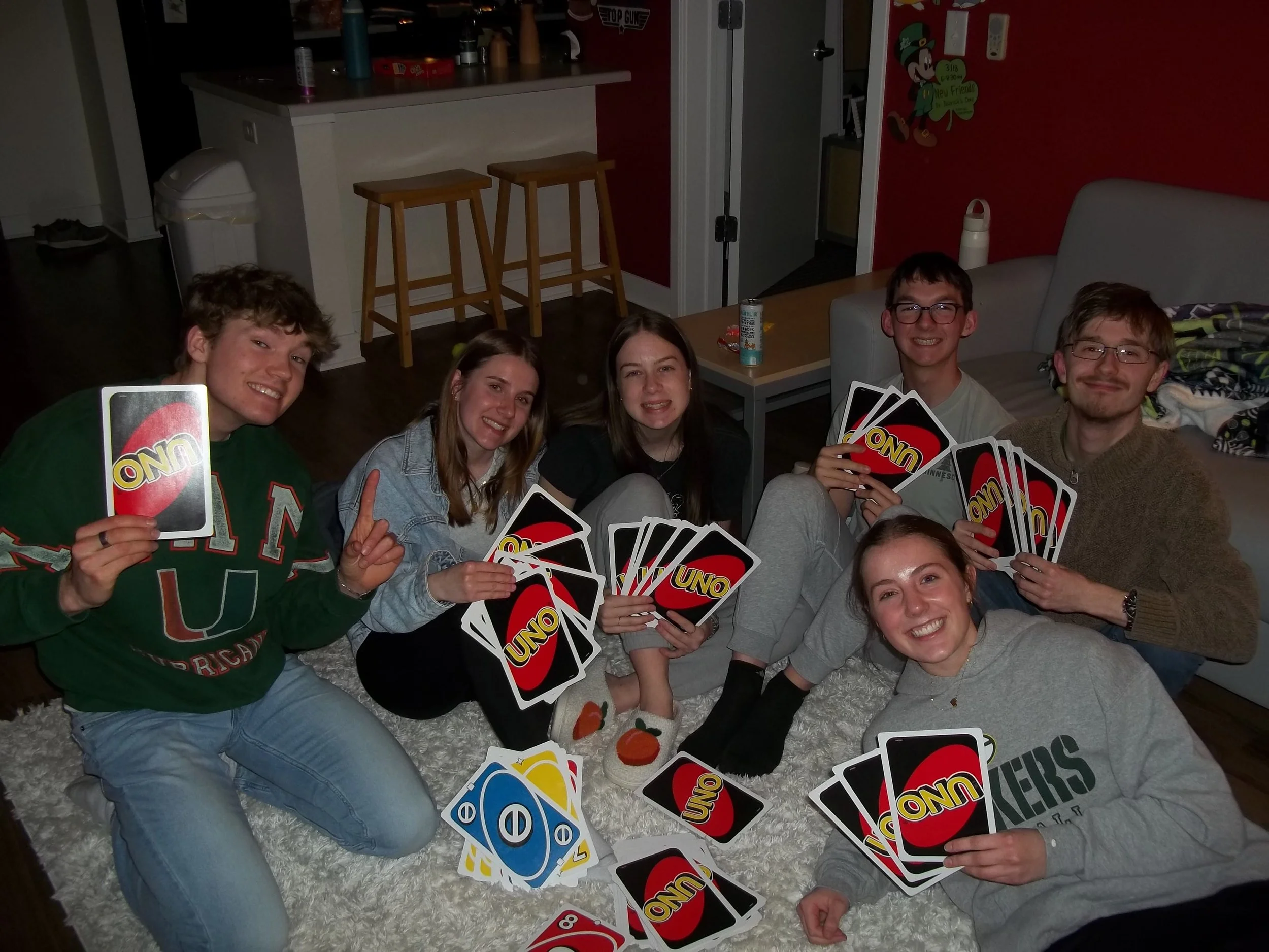 Friends playing giant Uno
