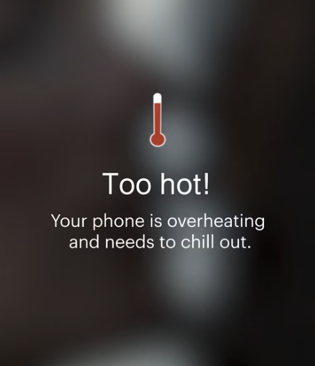 Phone alert message saying "Too hot!" indicating the phone is overheating and needs to cool down.