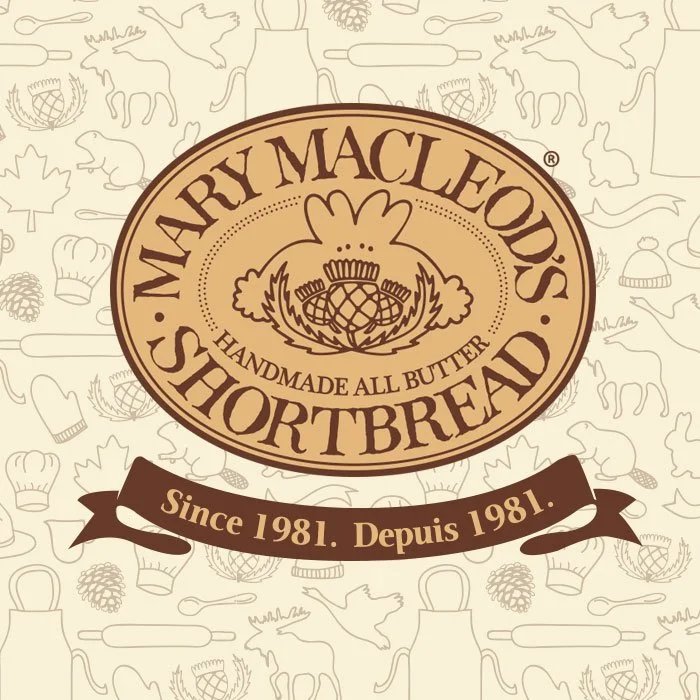 Mary MacLeod's Shortbread logo with text indicating handmade all butter shortbread since 1981, featuring a stylized flower or hop in the center of an oval logo.