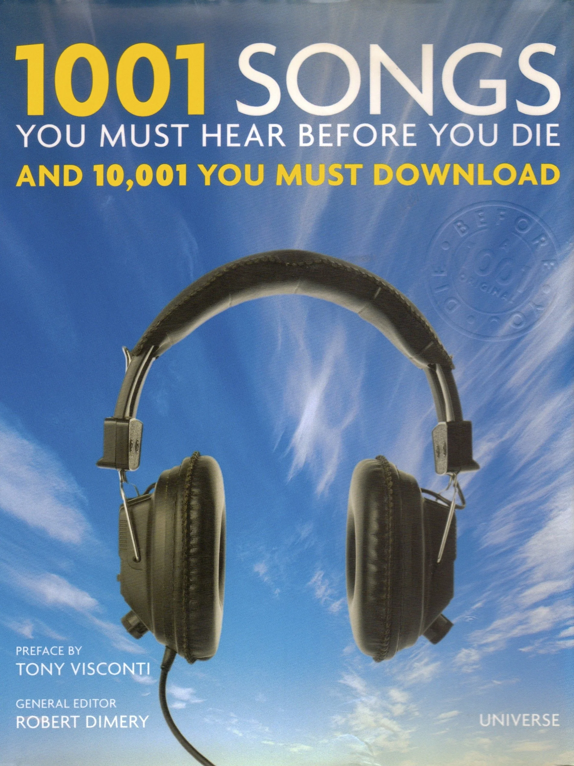 Cover of a book titled '1001 Songs You Must Hear Before You Die and 10,001 You Must Download' with a background image of a pair of headphones hanging against a blue sky with clouds.
