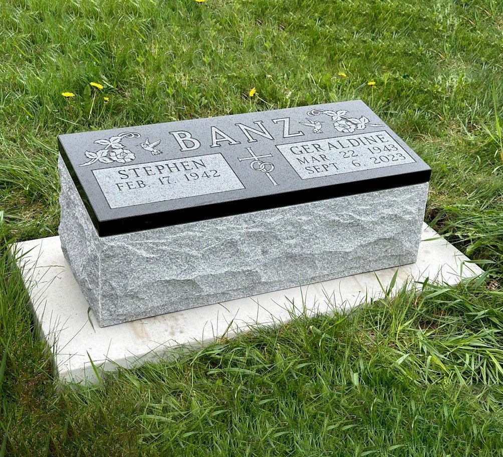 Gray granite cremation marker.