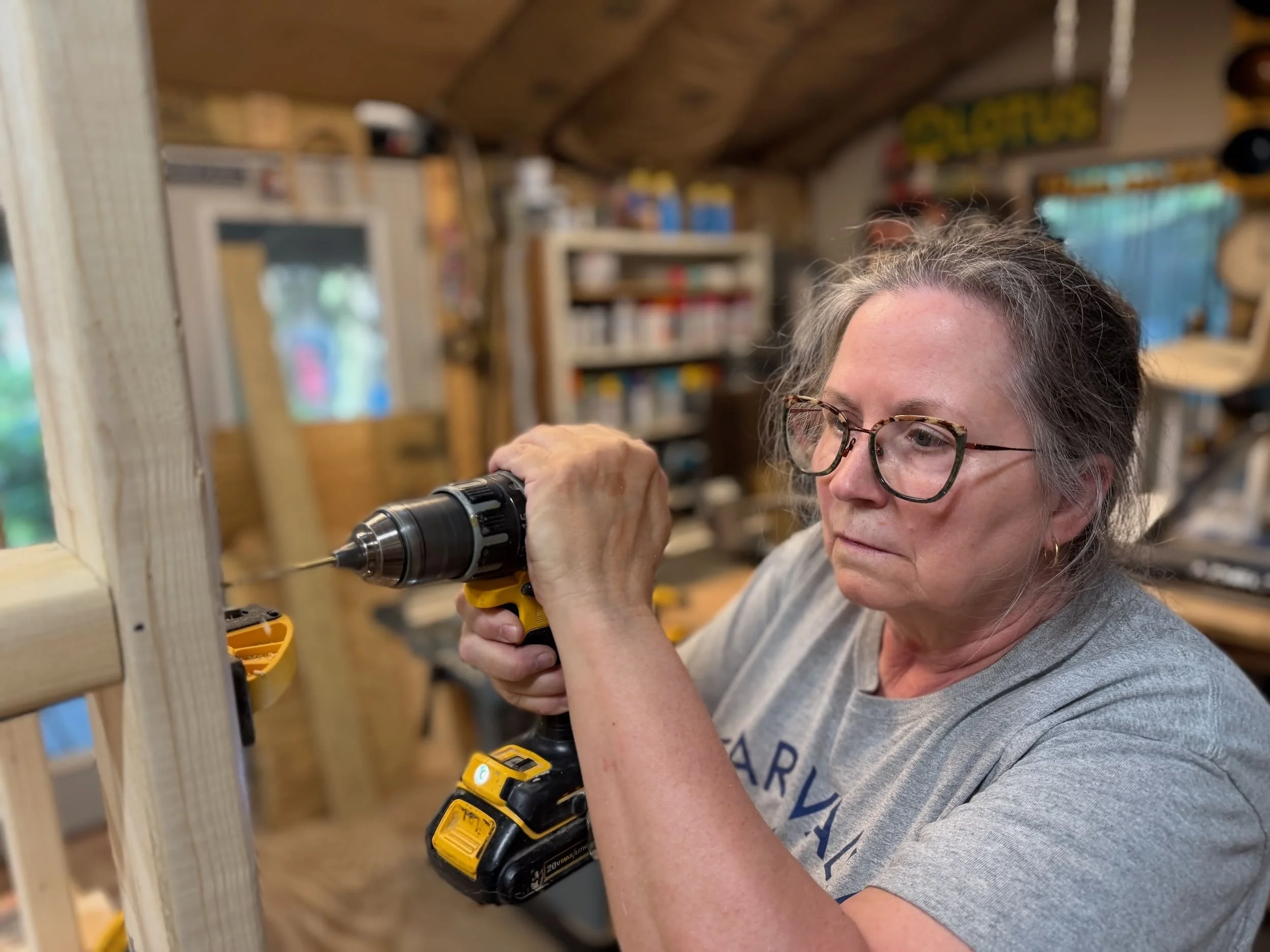 Stone sculptor/carpenter building her bench