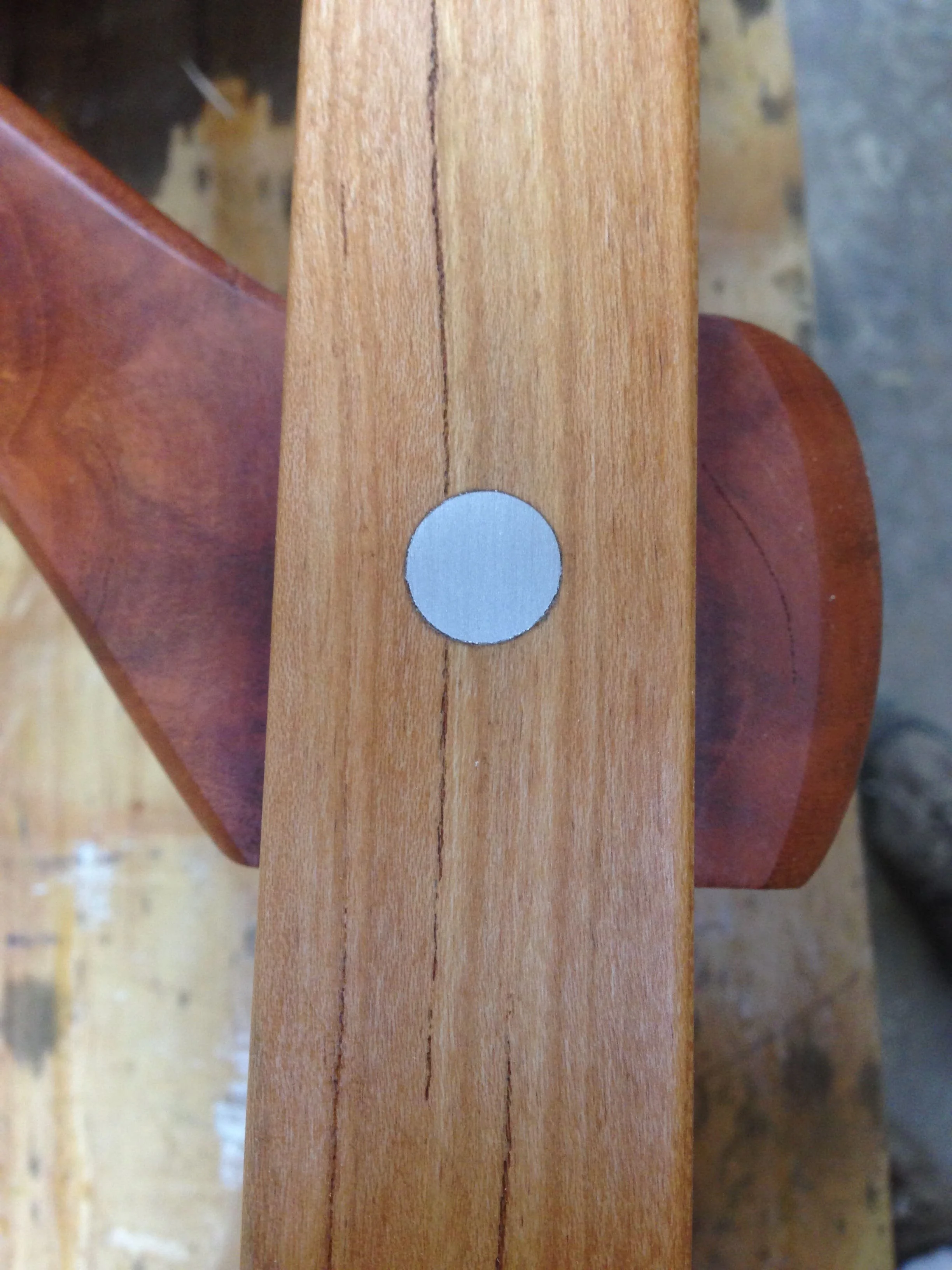 More table joinery, with an aluminum dowel pin - both the leg and the support are cherry