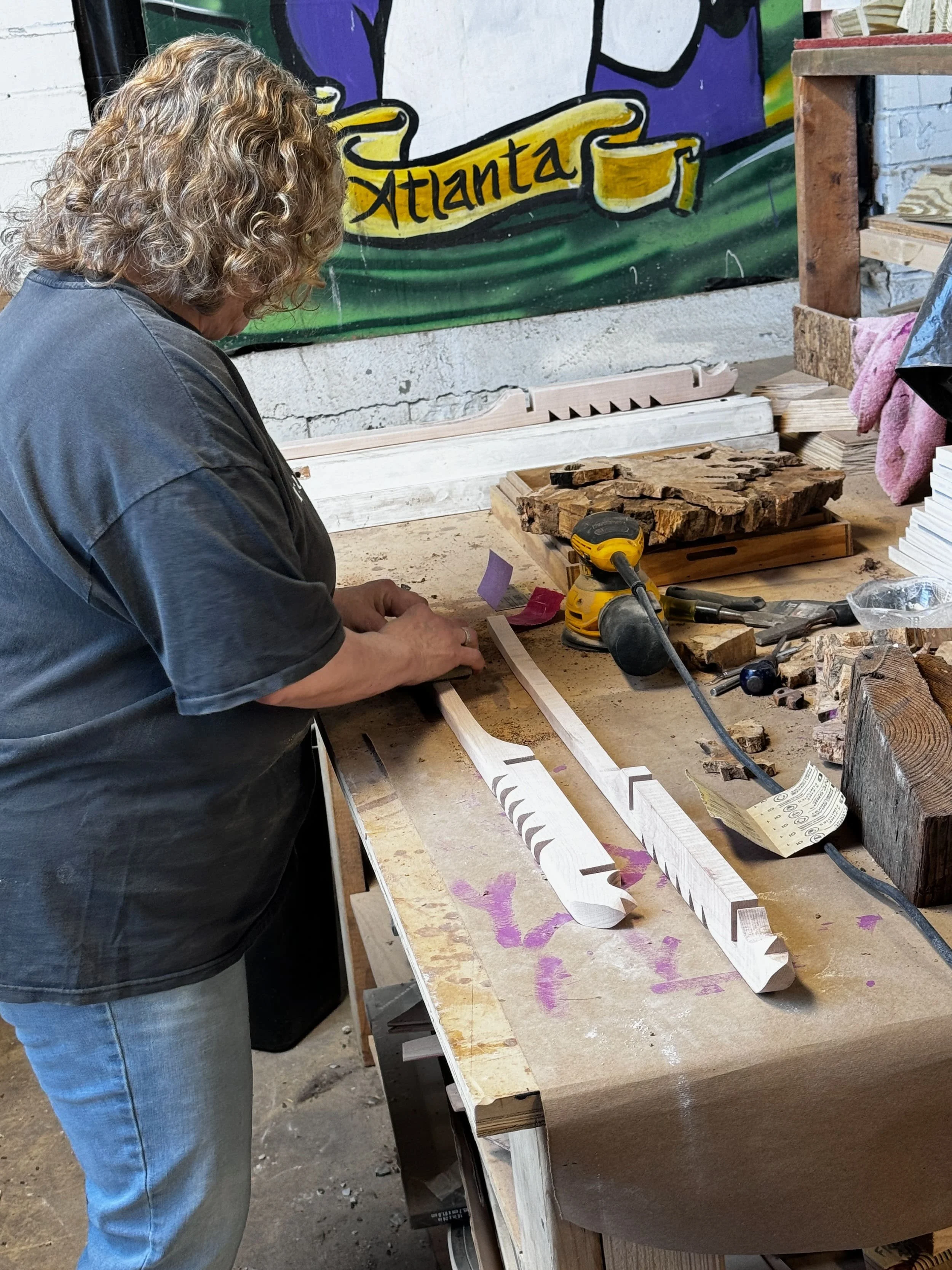 dee sanding down the legs (in class)