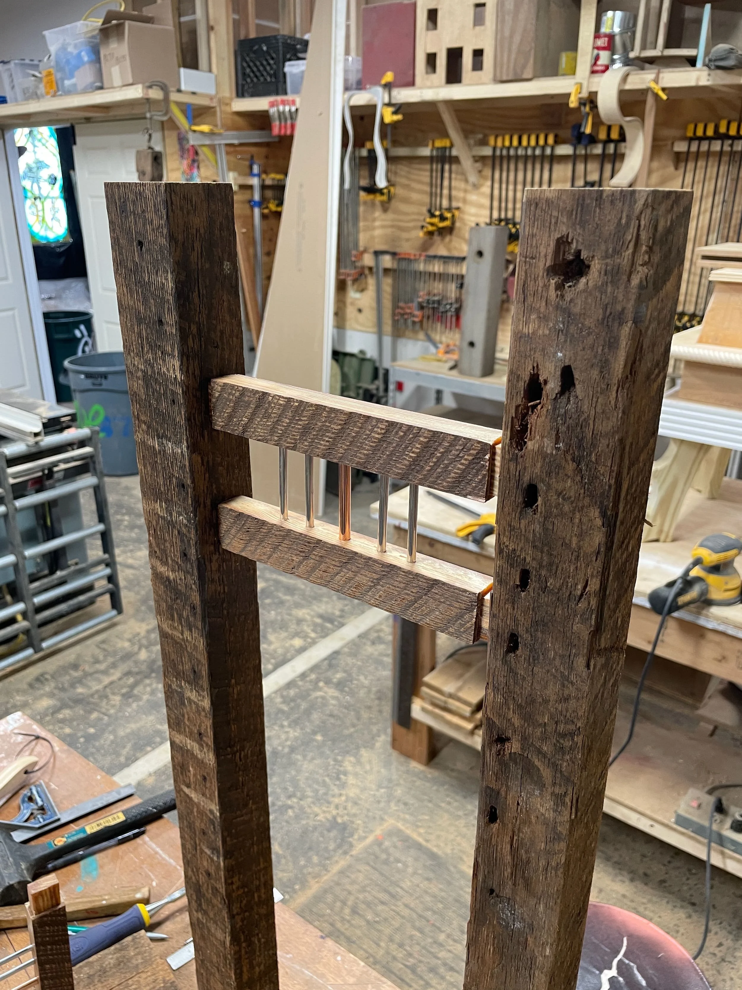 Reclaimed lumber with aluminum and copper tubing