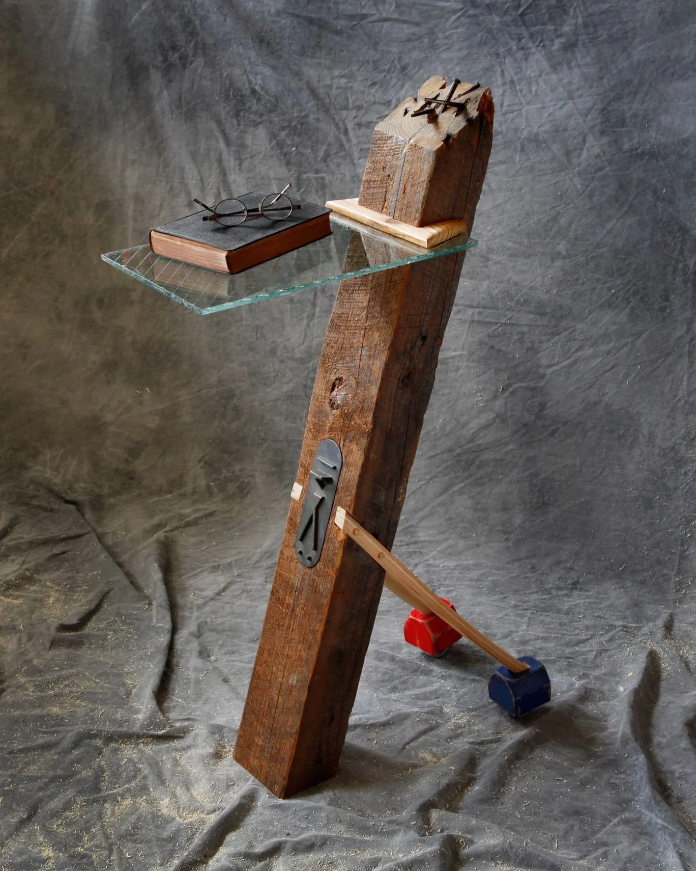 community foundation pedestal, beam, found objects and a window from a deconstructed school in detroit