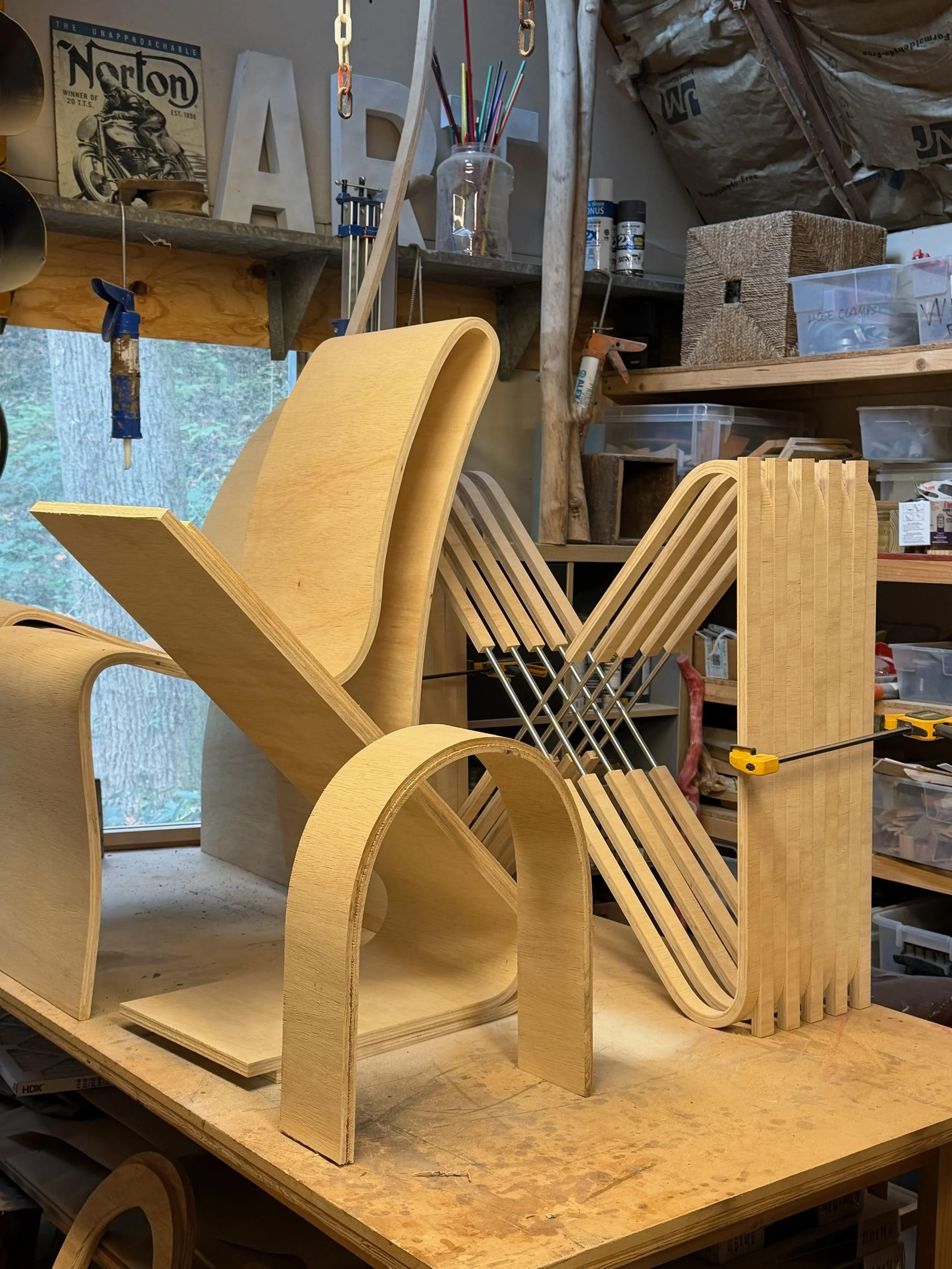Unfinished bent plywood pieces