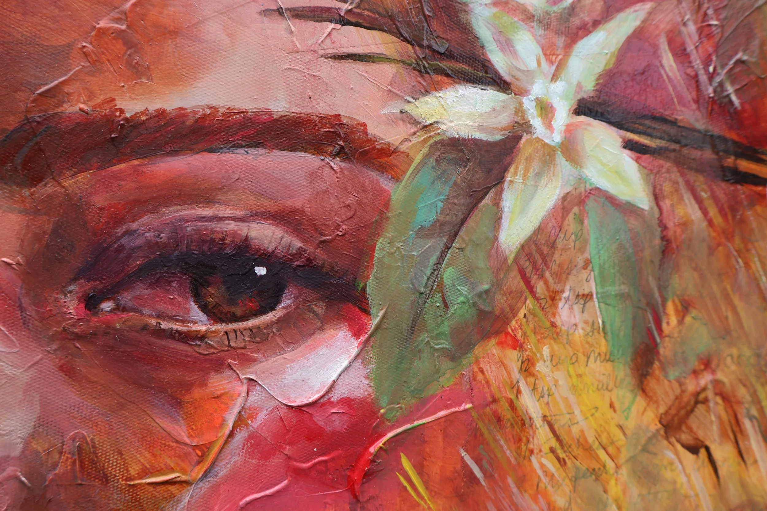 Close-up of a richly textured abstract oil painting in red, orange, pink, green, and yellow with expressive brushstrokes and handwritten markings.