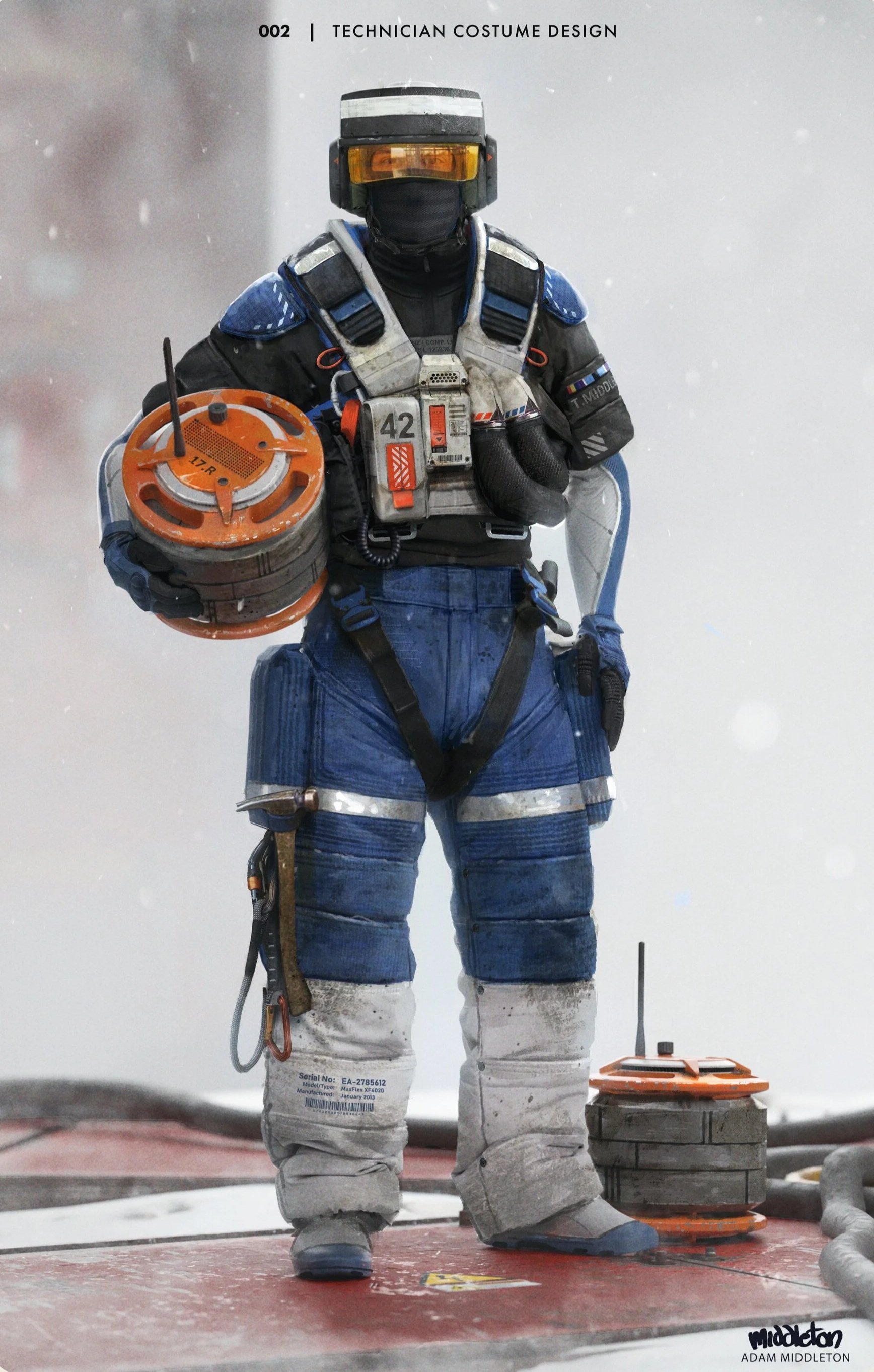 A person dressed in a futuristic or sci-fi style costume, wearing a helmet with a visor and protective gear, holding a round orange device, on a snowy surface with equipment nearby. The photo has a label "Technician Costume Design" and the name Adam 