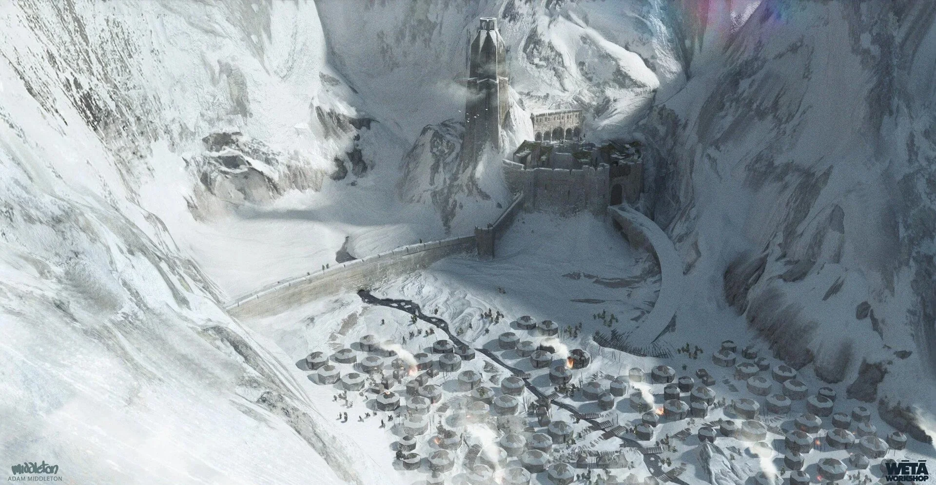A snow-covered mountainous landscape featuring a Helms Deep, and a village with small houses and tents, depicting a winter setting.