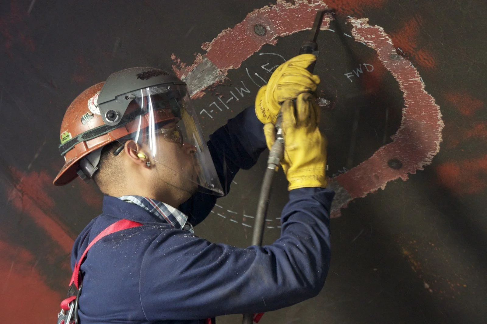 Shipyard worker in full PPE