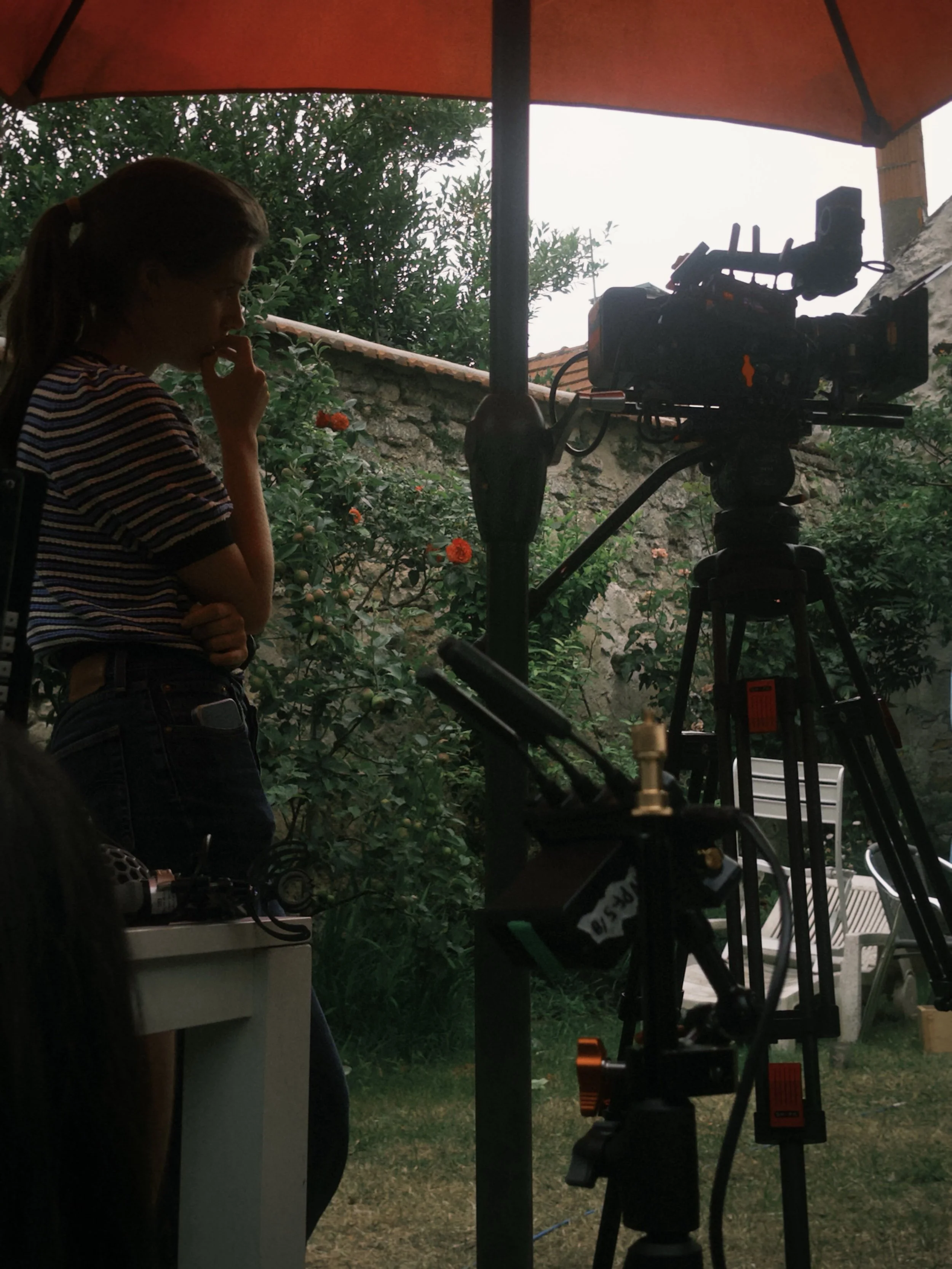 person looking at camera on tripod