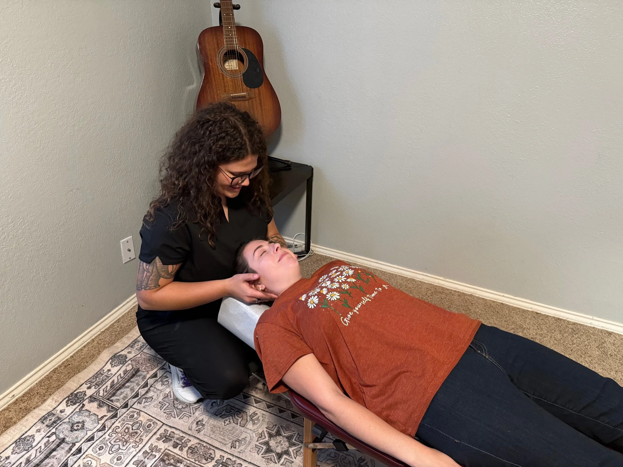 Channel Chiropractic chiropractor performing a chiropractic adjustment on an adult patient as part of personalized concierge care in Midland and Odessa, TX.