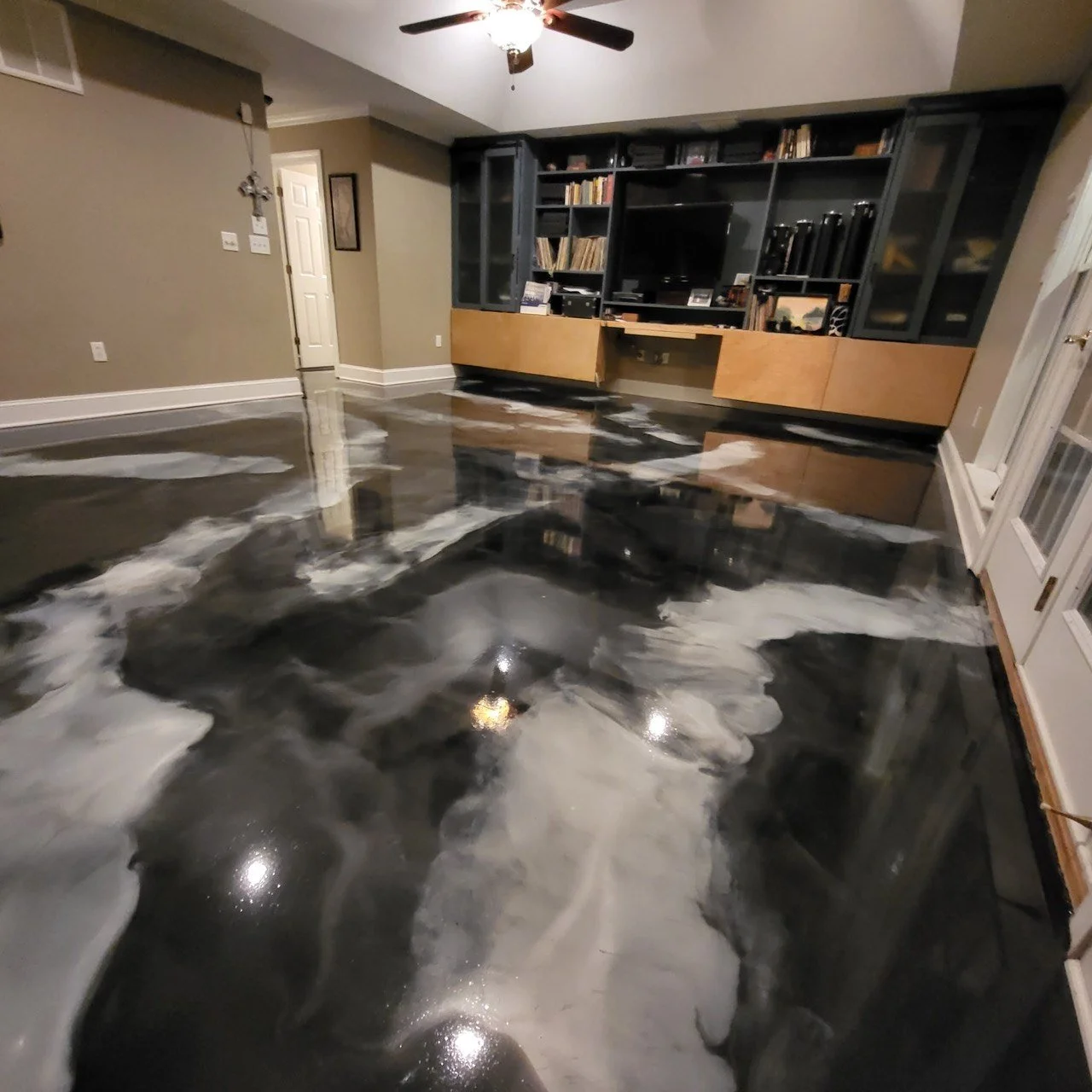 Living room with black and white epoxy floor