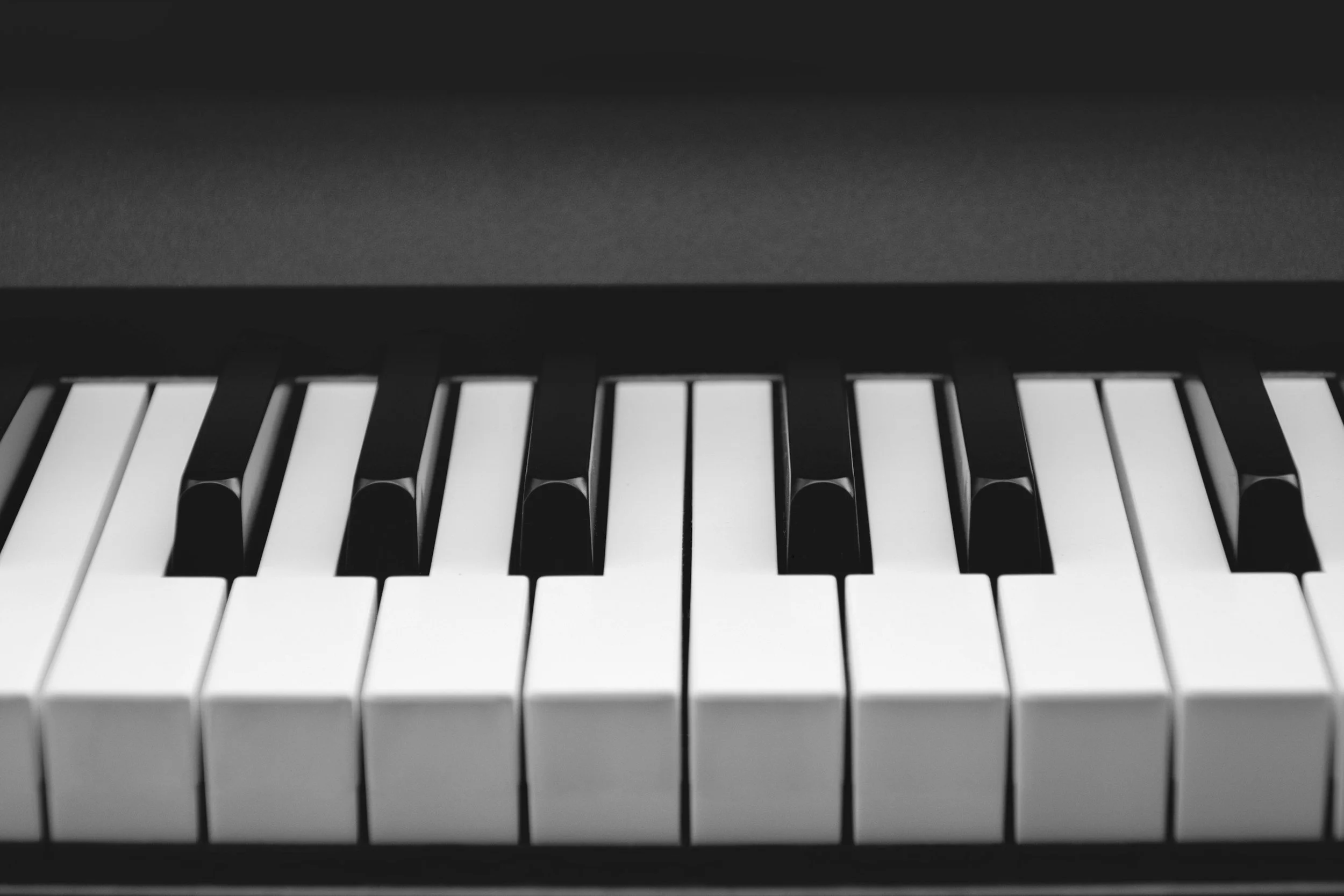 Close-up black-and-white view of piano keys