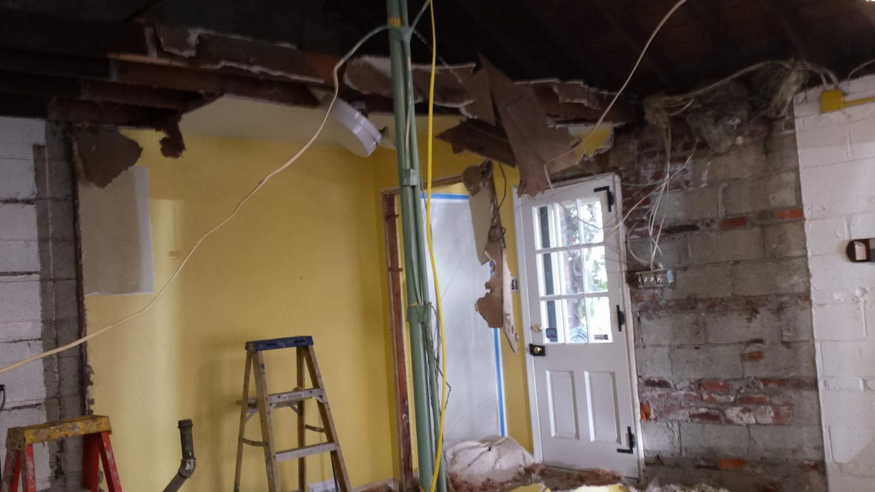 Attached Garage Renovation:
Renovating an attached garage and adding a laundry room and powder room