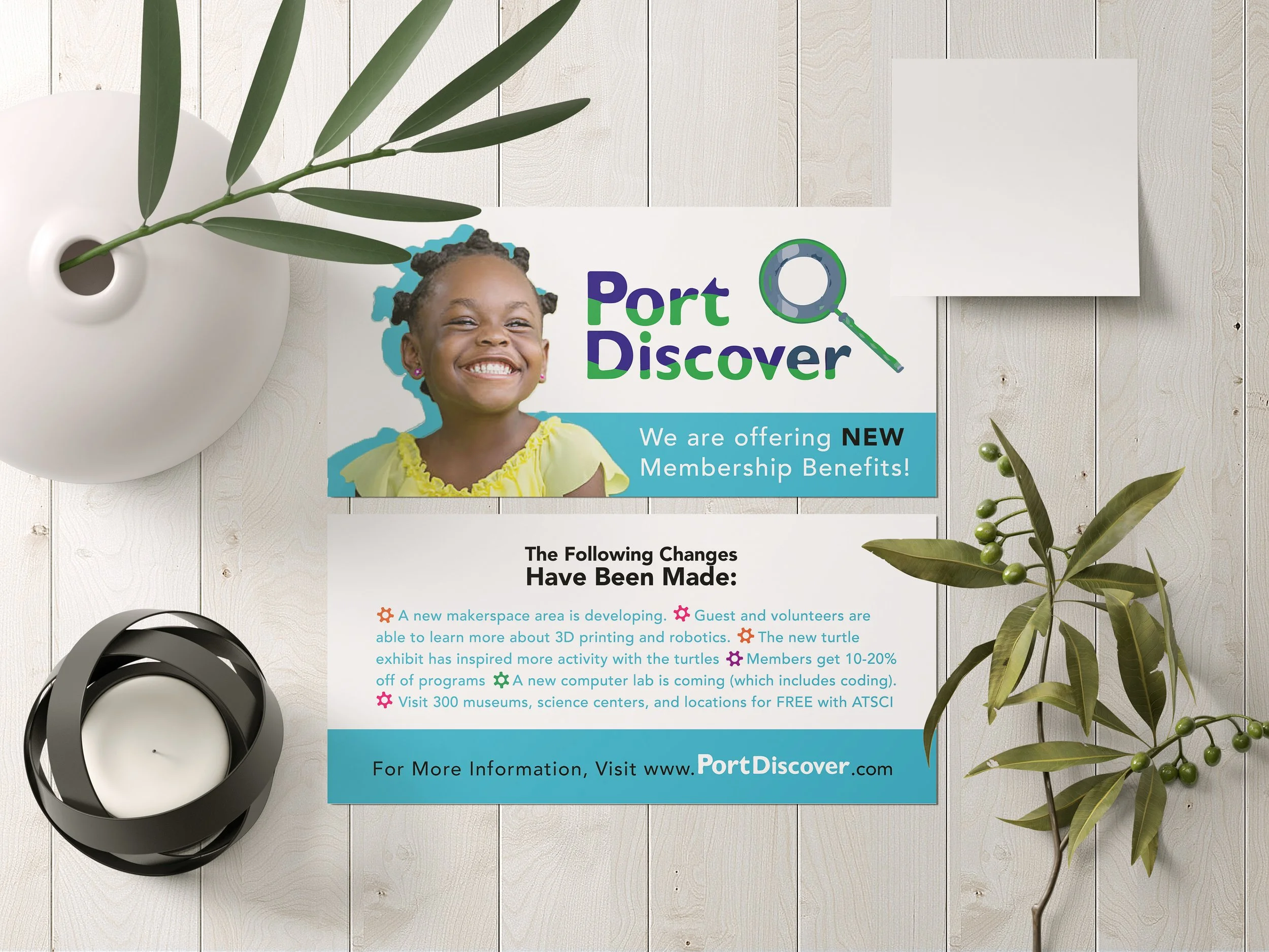 Flyer for Port Discover featuring a smiling young girl with natural hair, green leaves, a white vase, and a black camera on a light wooden surface.