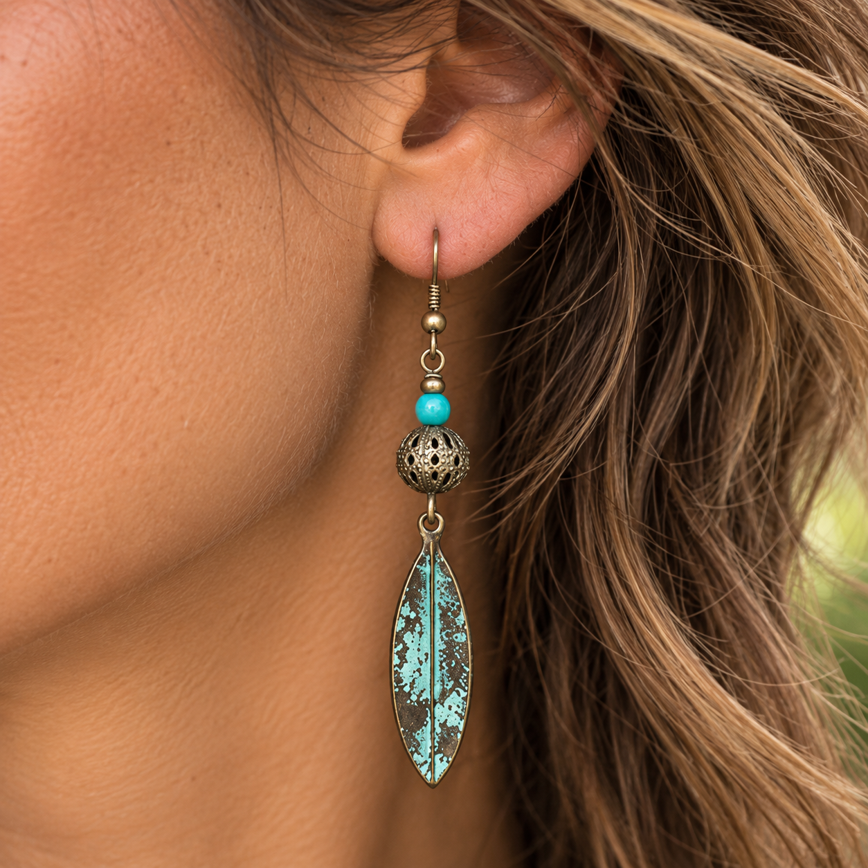 Antique Turquoise Patina Earring Close-Up.png