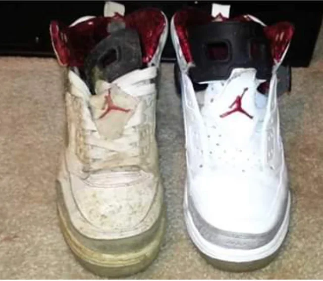 A pair of white and red Air Jordan sneakers, one very dirty and worn, the other clean and new, placed side by side on a carpeted floor.