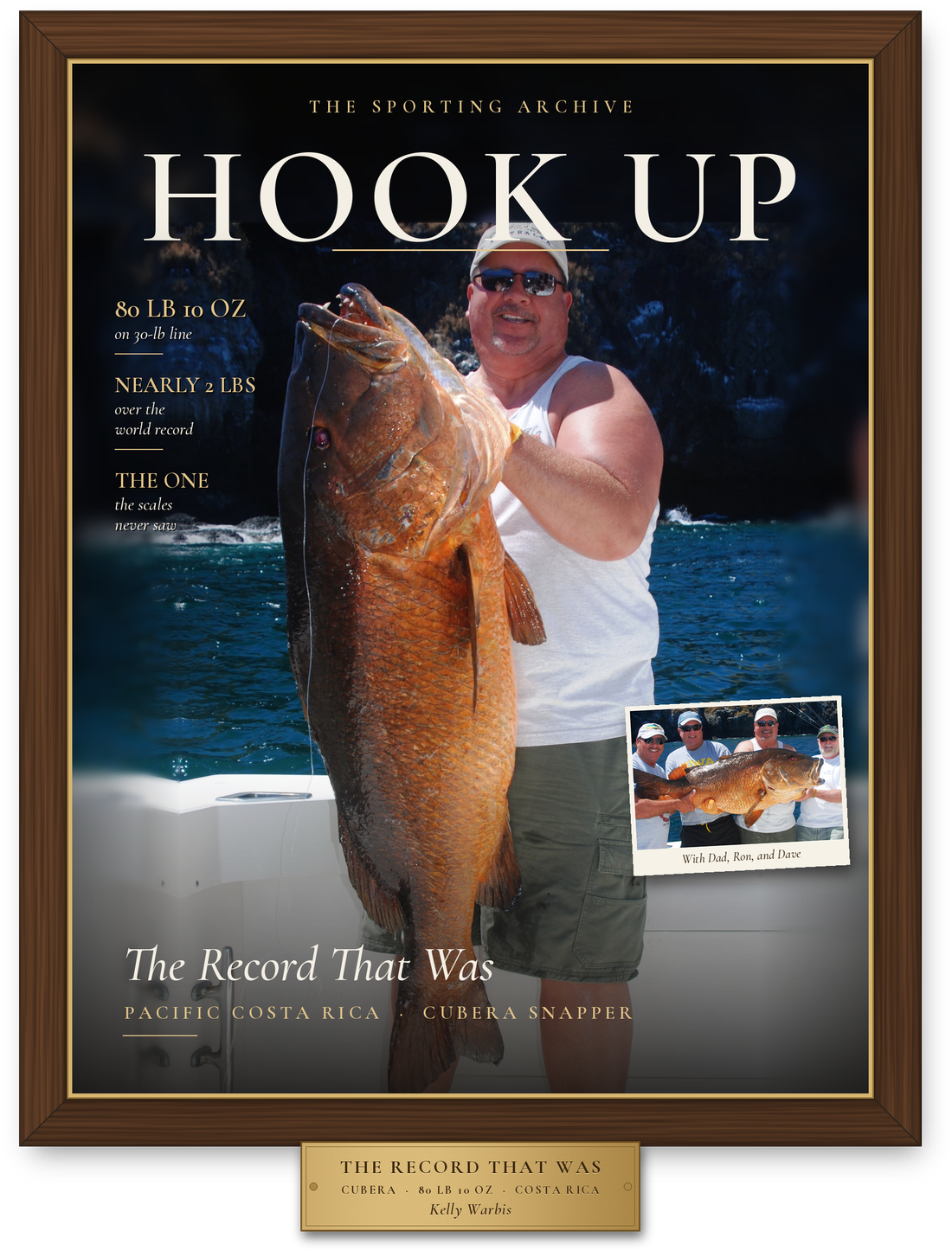 Signature Cover: a HOOK UP magazine cover of an 80-pound cubera snapper, framed in dark walnut with an engraved brass plate.