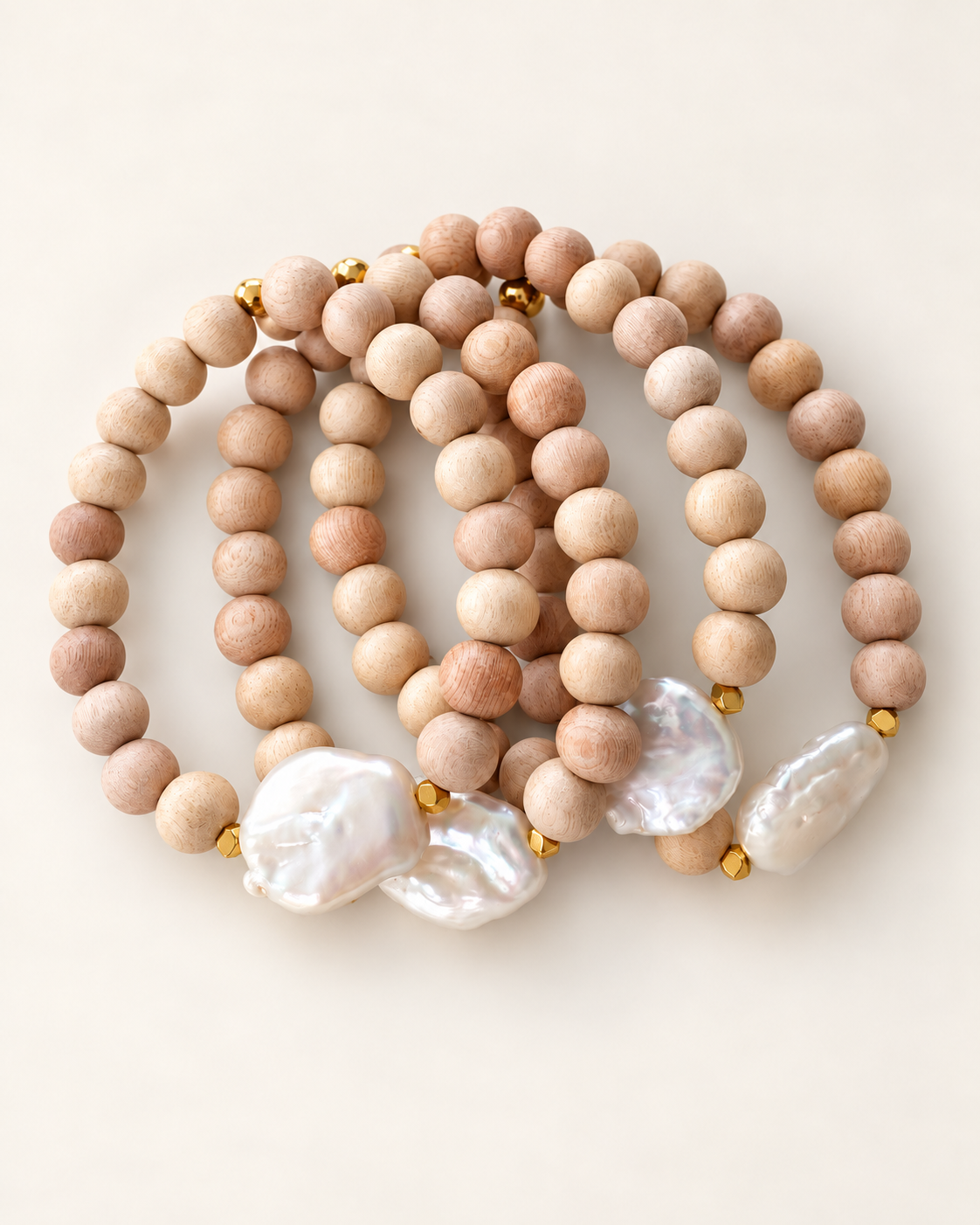 Natural Rosewood and Baroque Pearl Bracelets.png