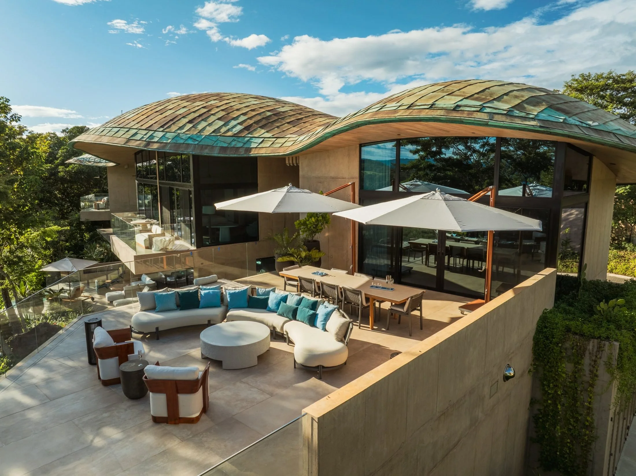 Terrace with lounge seating under a copper roof at a luxury villa in Peninsula Papagayo, Costa Rica
