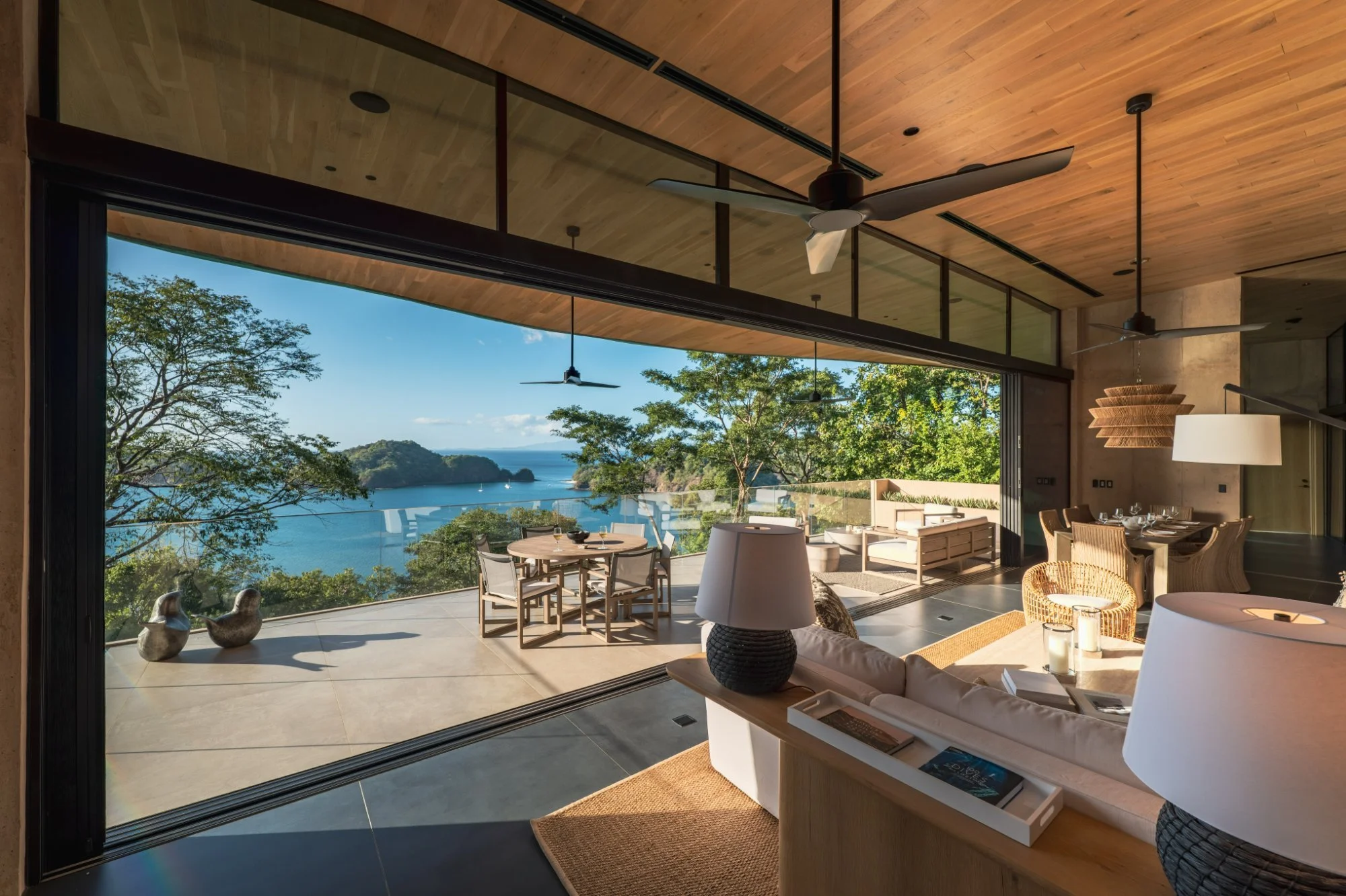 Open living room and terrace with ocean views at a luxury villa in Peninsula Papagayo, Costa Rica