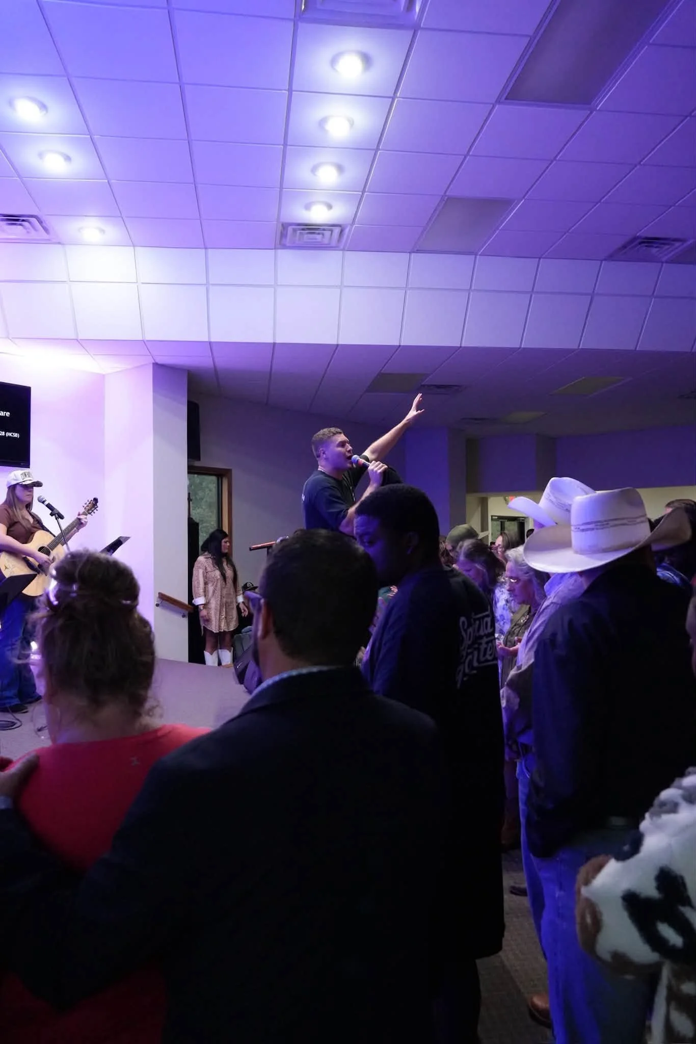 Congregation worshiping during a Go Forth Ministries service
