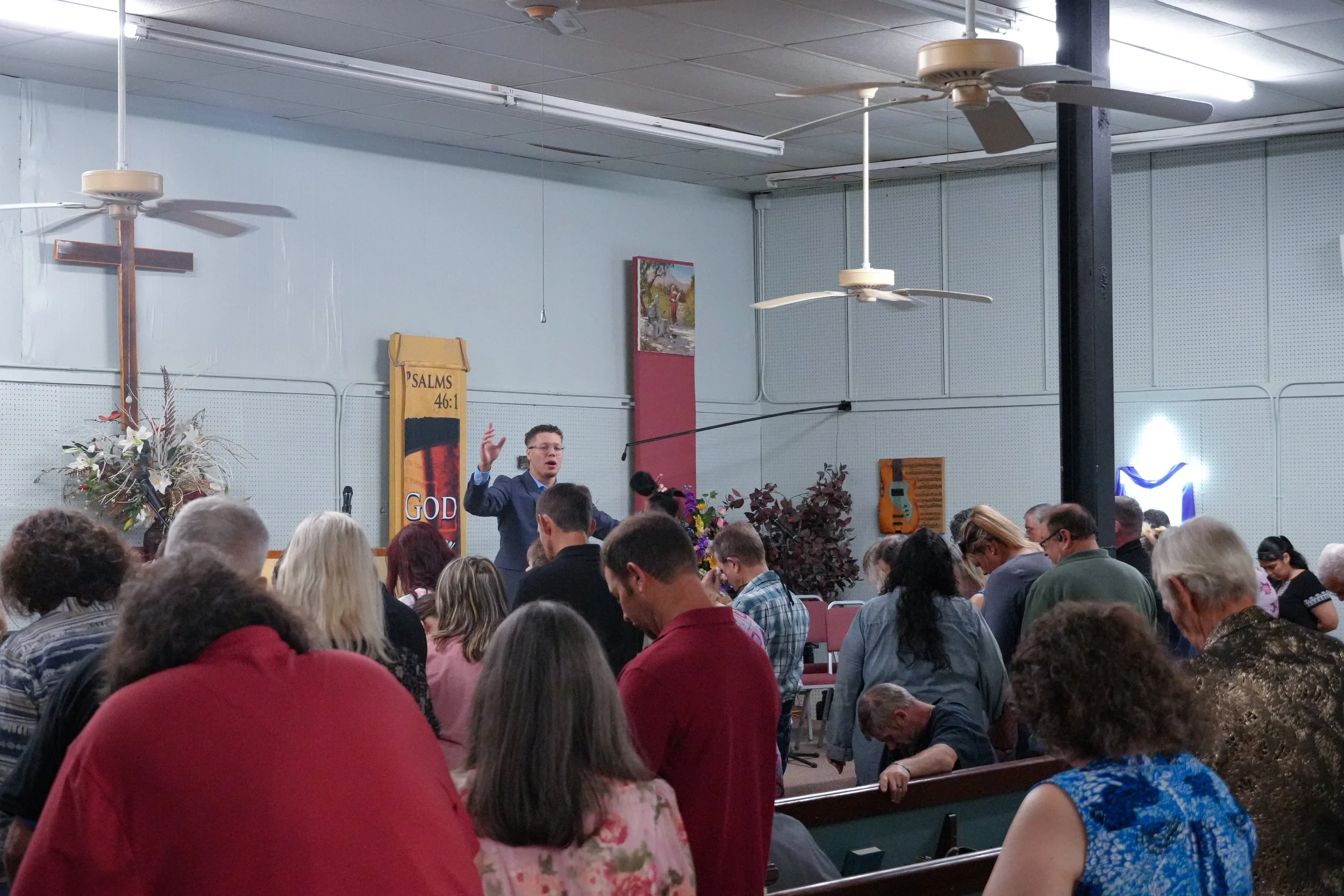 Congregation worshiping during a Go Forth Ministries service