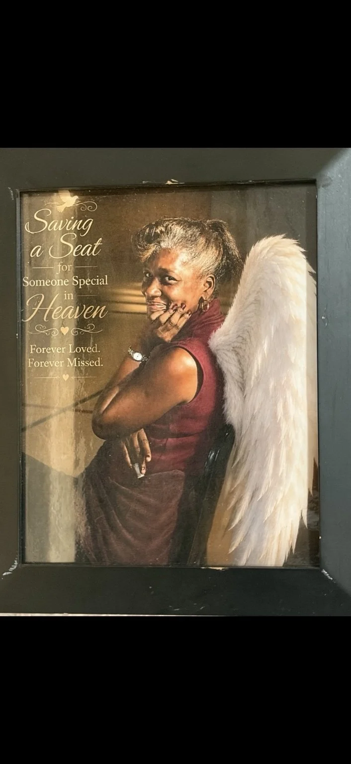 Personalized framed memorial keepsake honoring a loved one with a photo and remembrance message.