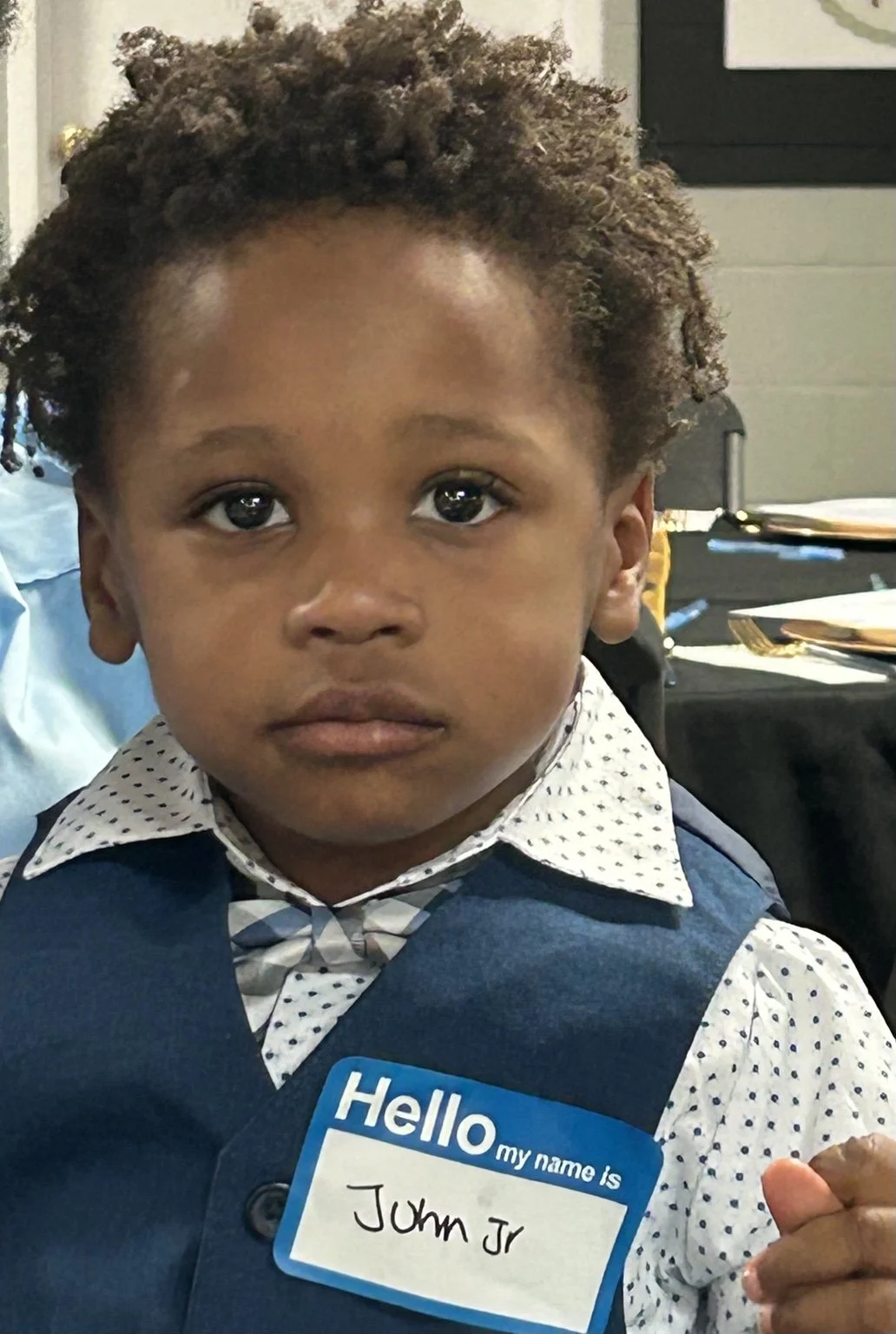 Portrait of John Jr. “Bunny,” Mini CEO of Ink & Go Creative Services.
