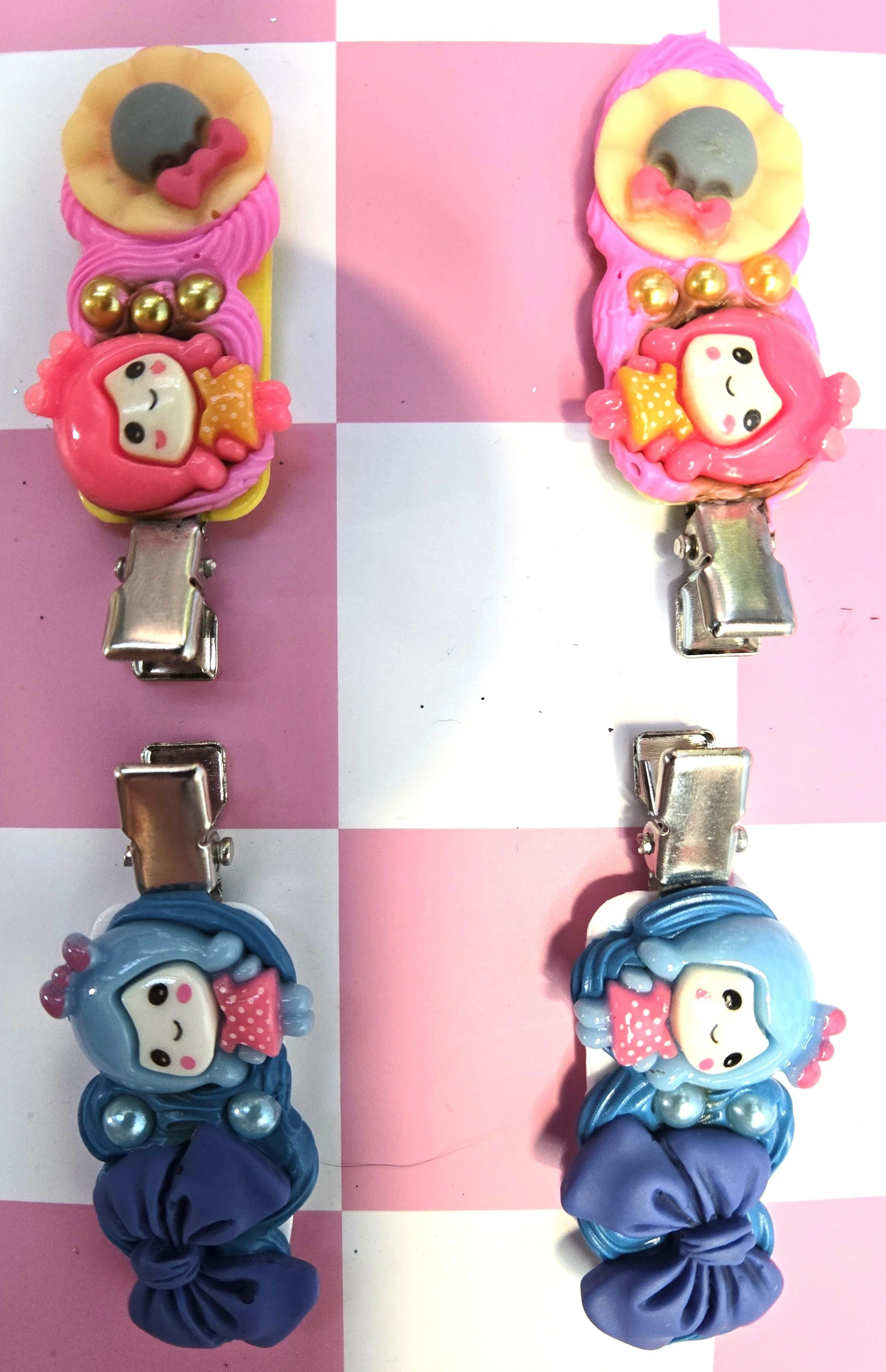 BLUE HAIRED GIRL WITH BLUE PEARLS AND PINK HAIRED GIRL WITH GOLD PEARLS ON SILVER HAIRCLIPS.jpg