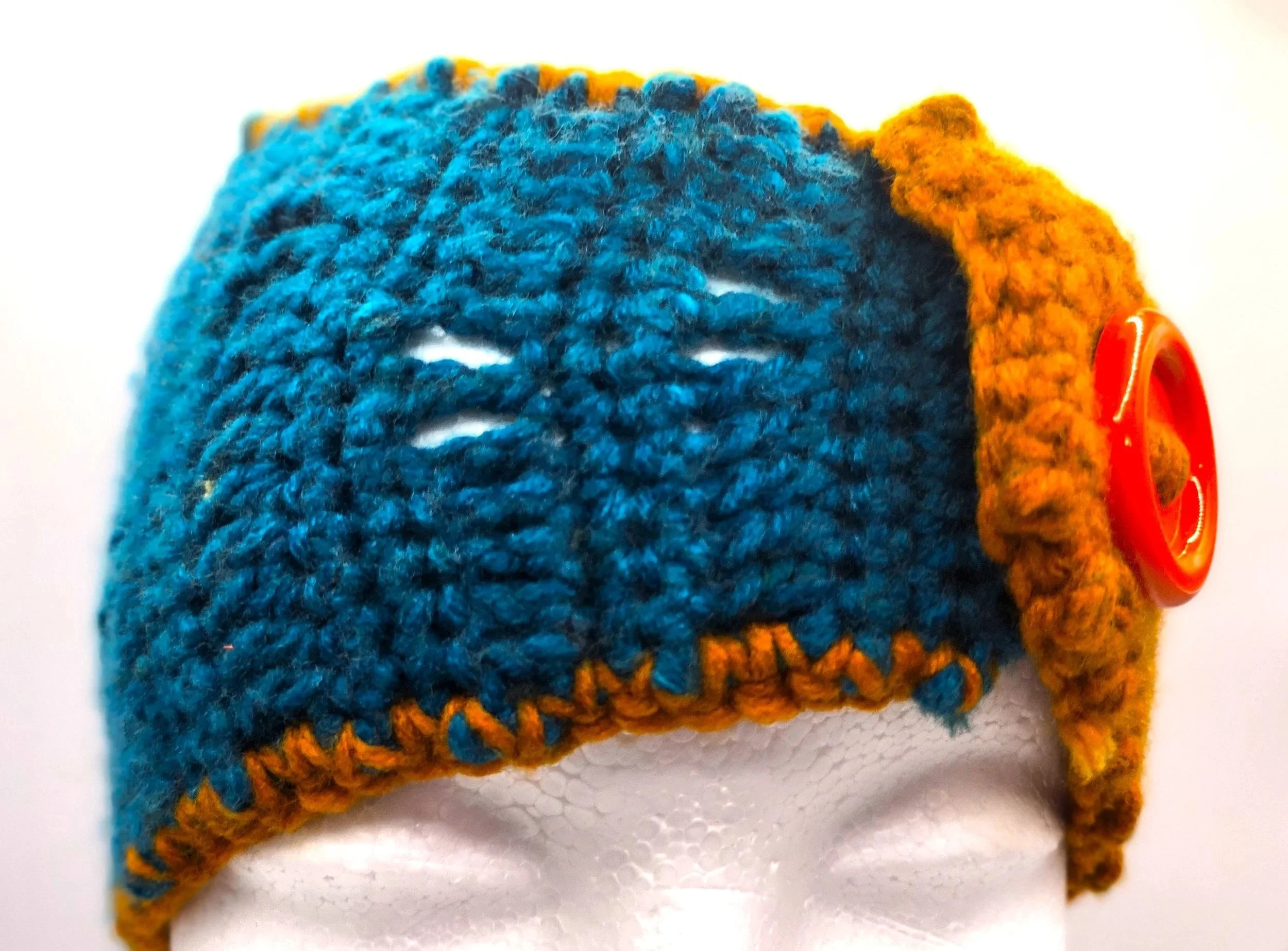 golden+brown+and+pine+green+colored+stripes+withorange+button+crochet+headband.jpg