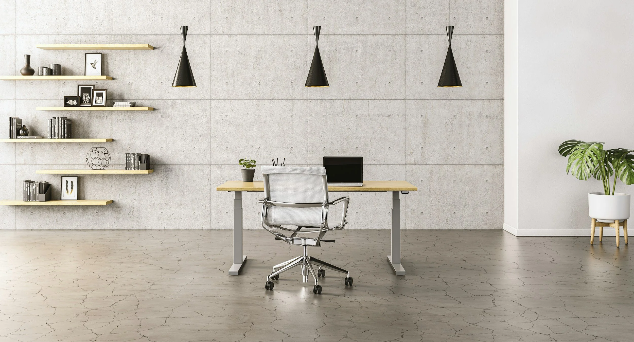 Modern office workstation with a laptop on a desk in a bright open workspace