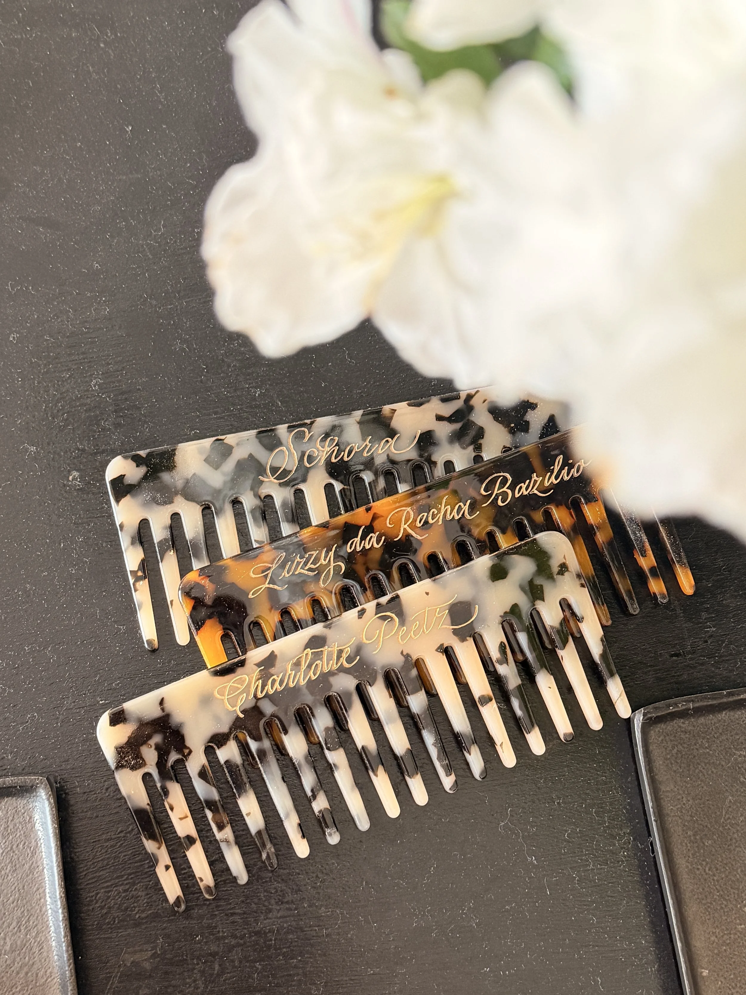 Live comb engraving by Gaia Amsterdam for Nakd in 2026