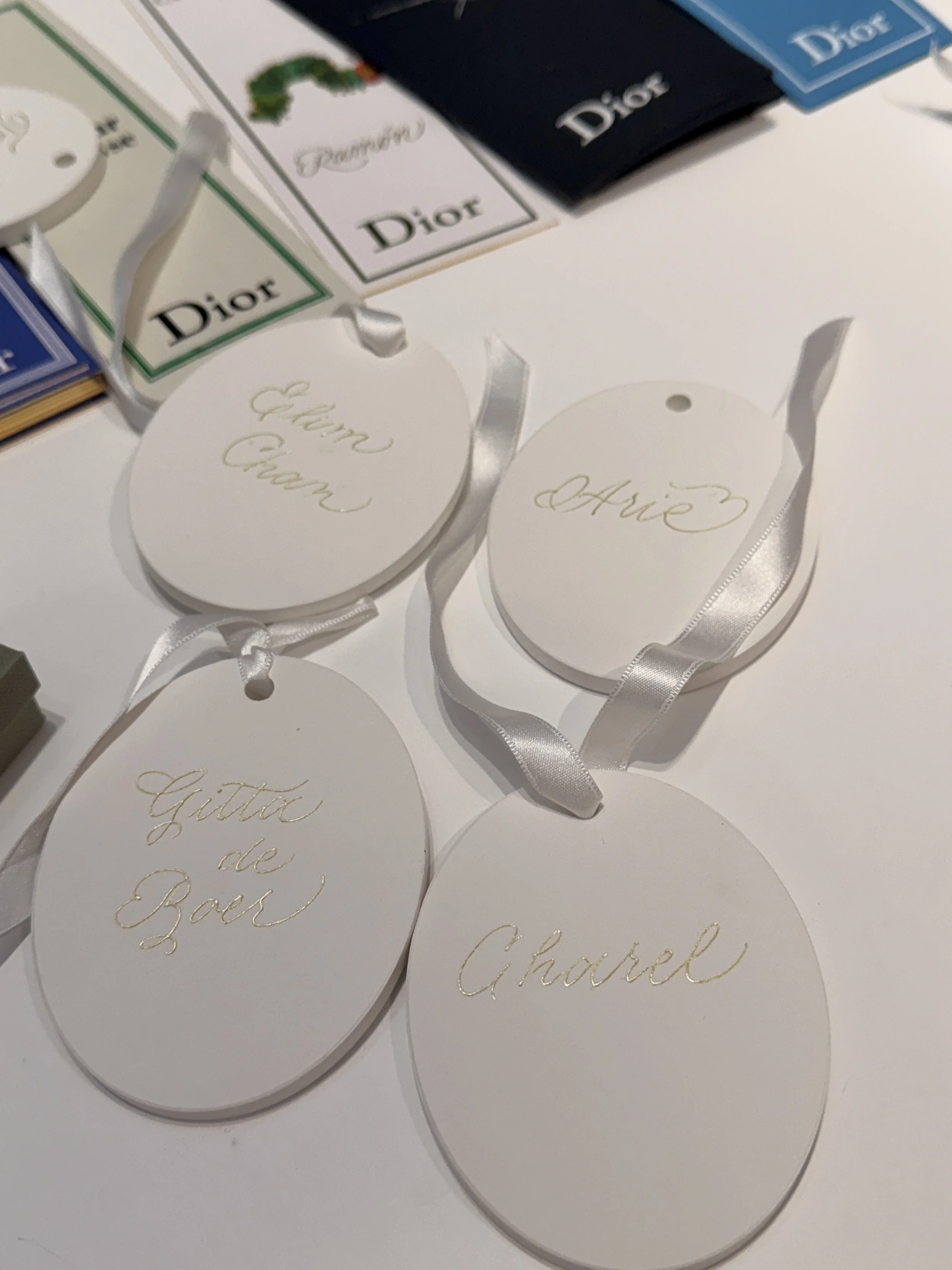 Dior Medallion Calligraphy engraving at the Boutique