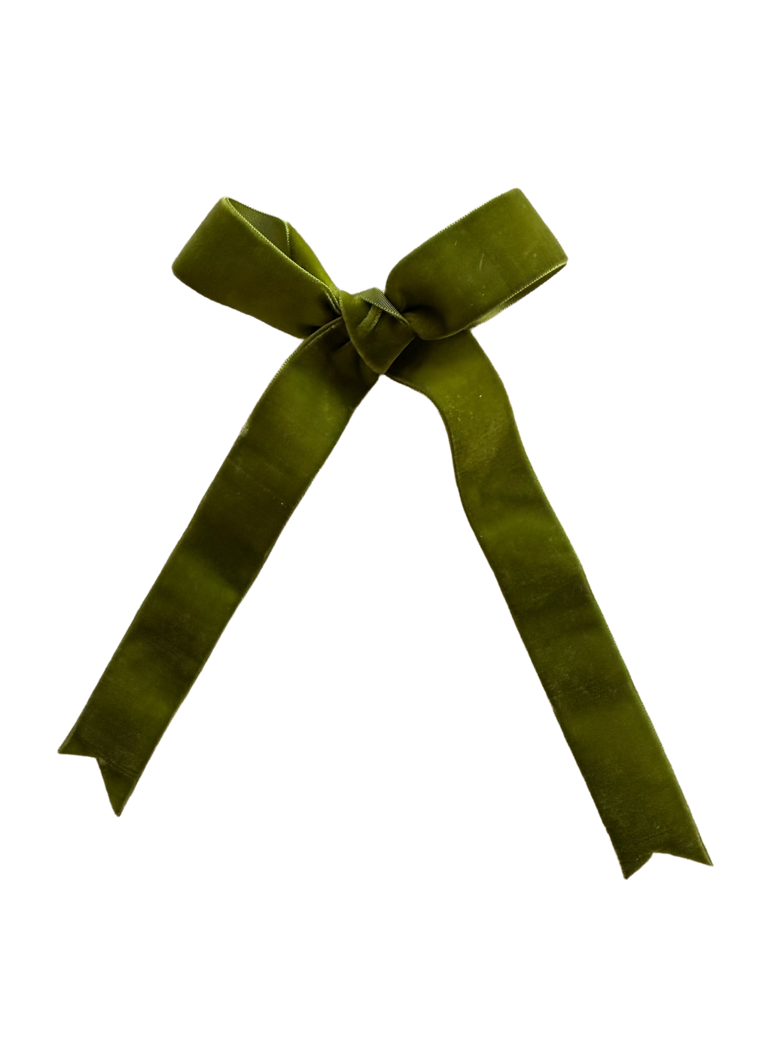 Close-up of a green velvet bow with long tails, tied at the center.